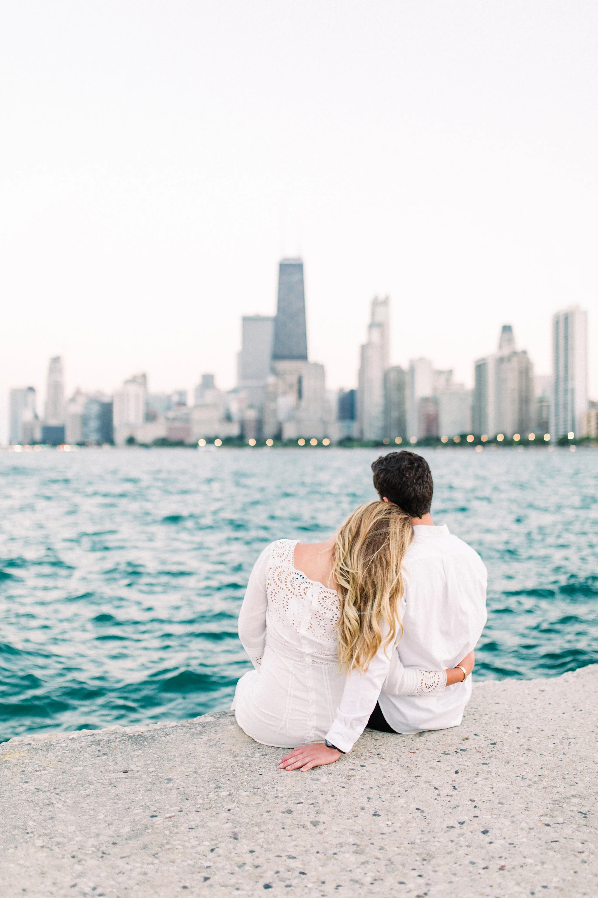 Romantic North Avenue Beach Chicago engagement session captured by Kendra Denault Photography. See more engagement photo ideas on CHItheeWED.com!