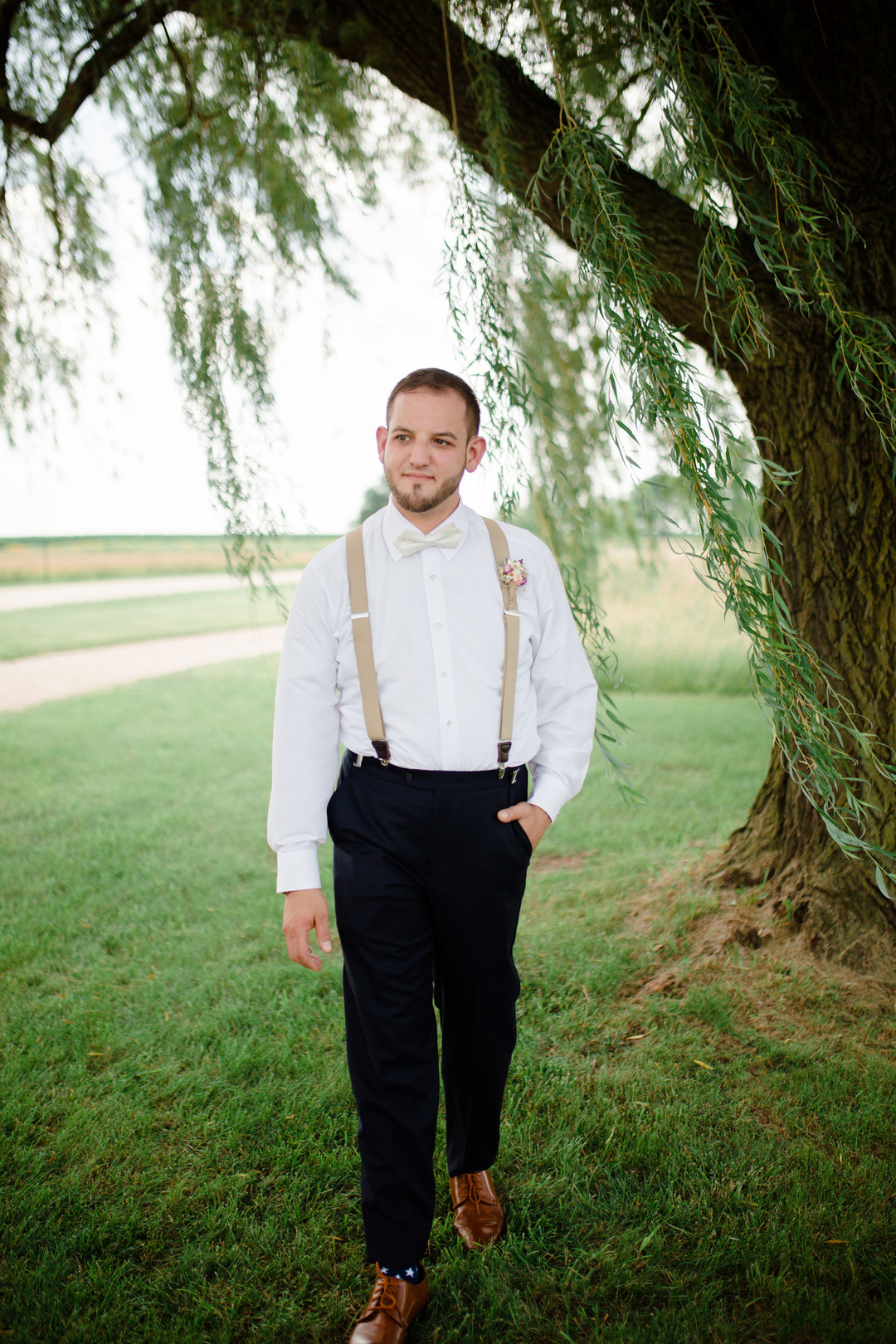 Grooms rustic wedding attire: Rustic country wedding in Minooka, IL captured by Katie Brsan Photography. Visit CHItheeWED.com for more wedding inspiration!