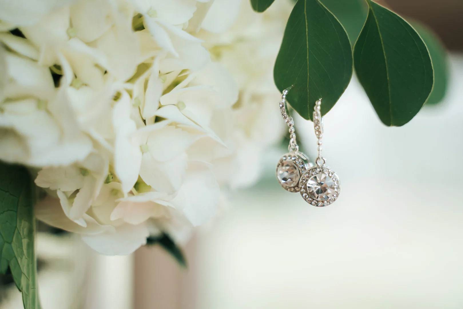 Wedding earrings: Beautiful Illinois wedding at Riverside Receptions captured by Windy City Production. See more wedding ideas at CHItheeWED.com!