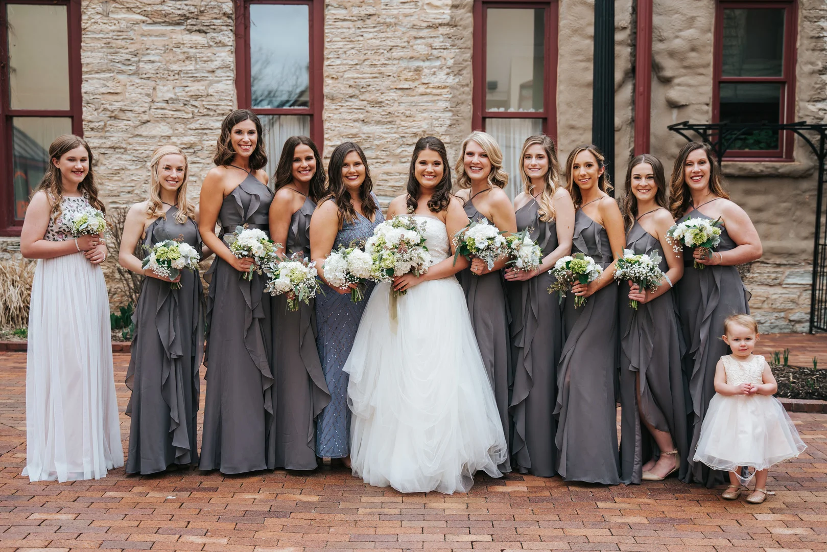 Gray bridesmaids dresses: Beautiful Illinois wedding at Riverside Receptions captured by Windy City Production. See more wedding ideas at CHItheeWED.com!