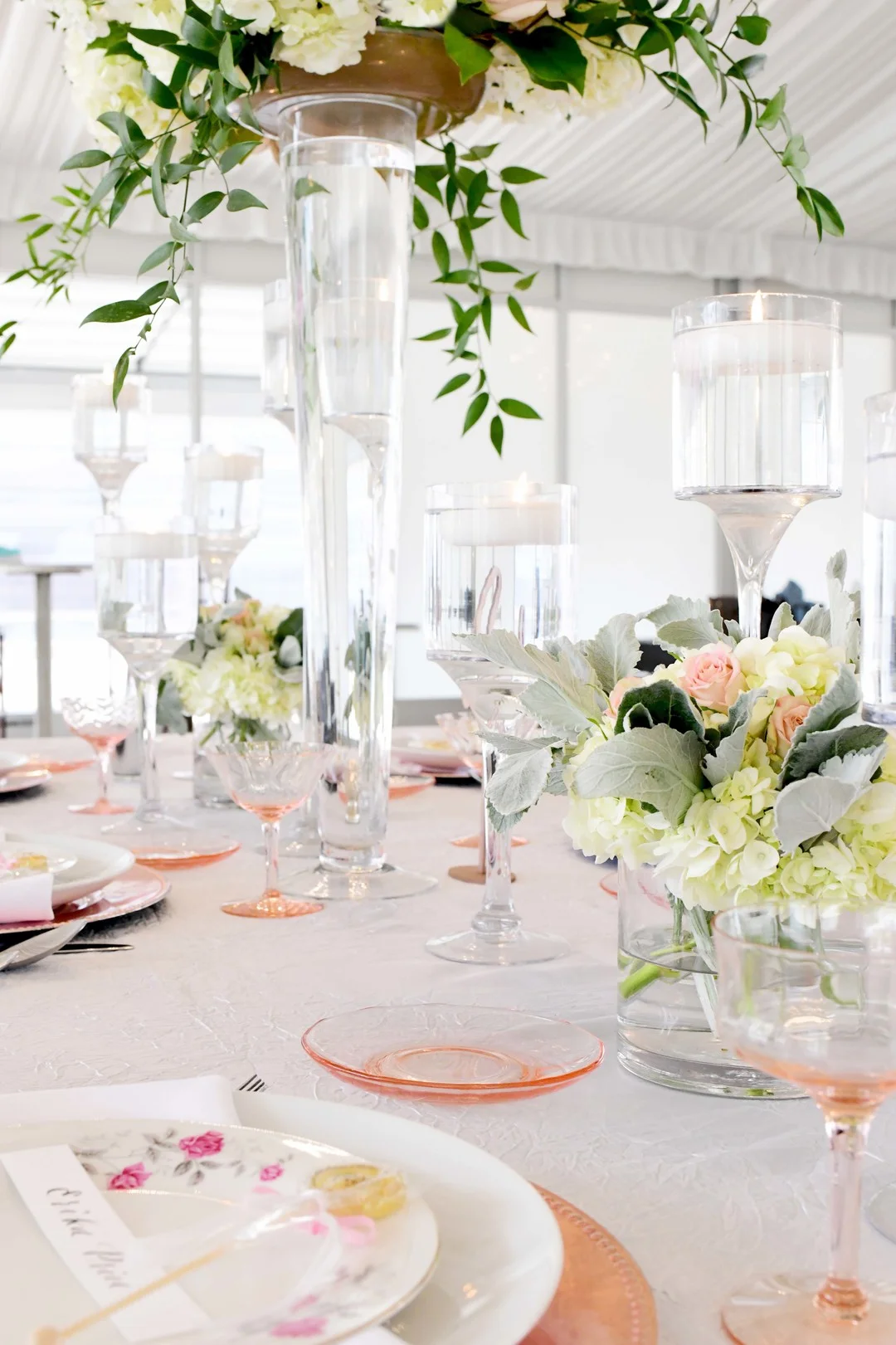 Wedding reception decor: Romantic ivory and rose gold wedding inspiration captured by Lori Sapio. See more elegant wedding ideas at CHItheeWED.com!