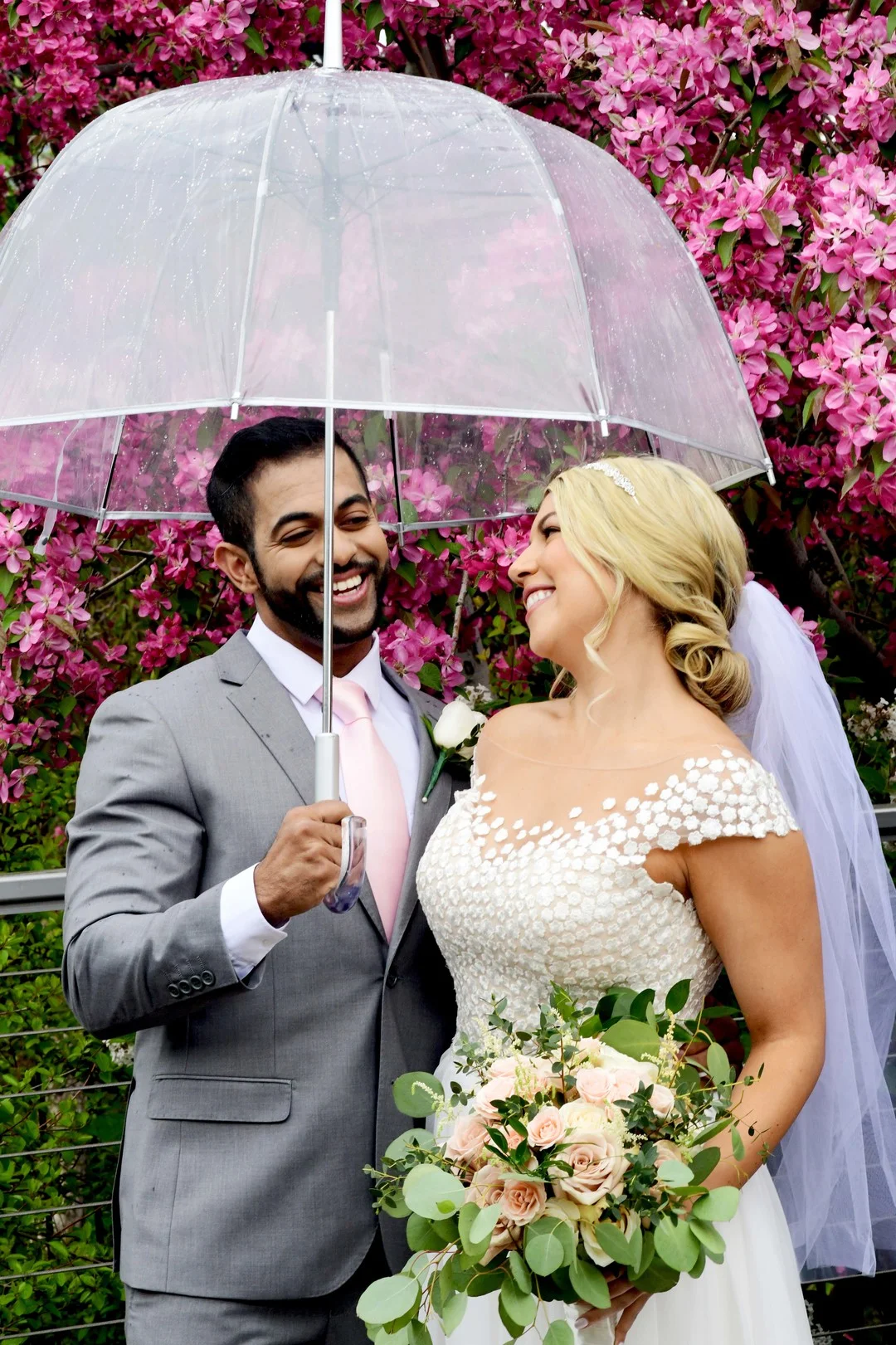 Rainy day wedding photos: Romantic ivory and rose gold wedding inspiration captured by Lori Sapio. See more elegant wedding ideas at CHItheeWED.com!