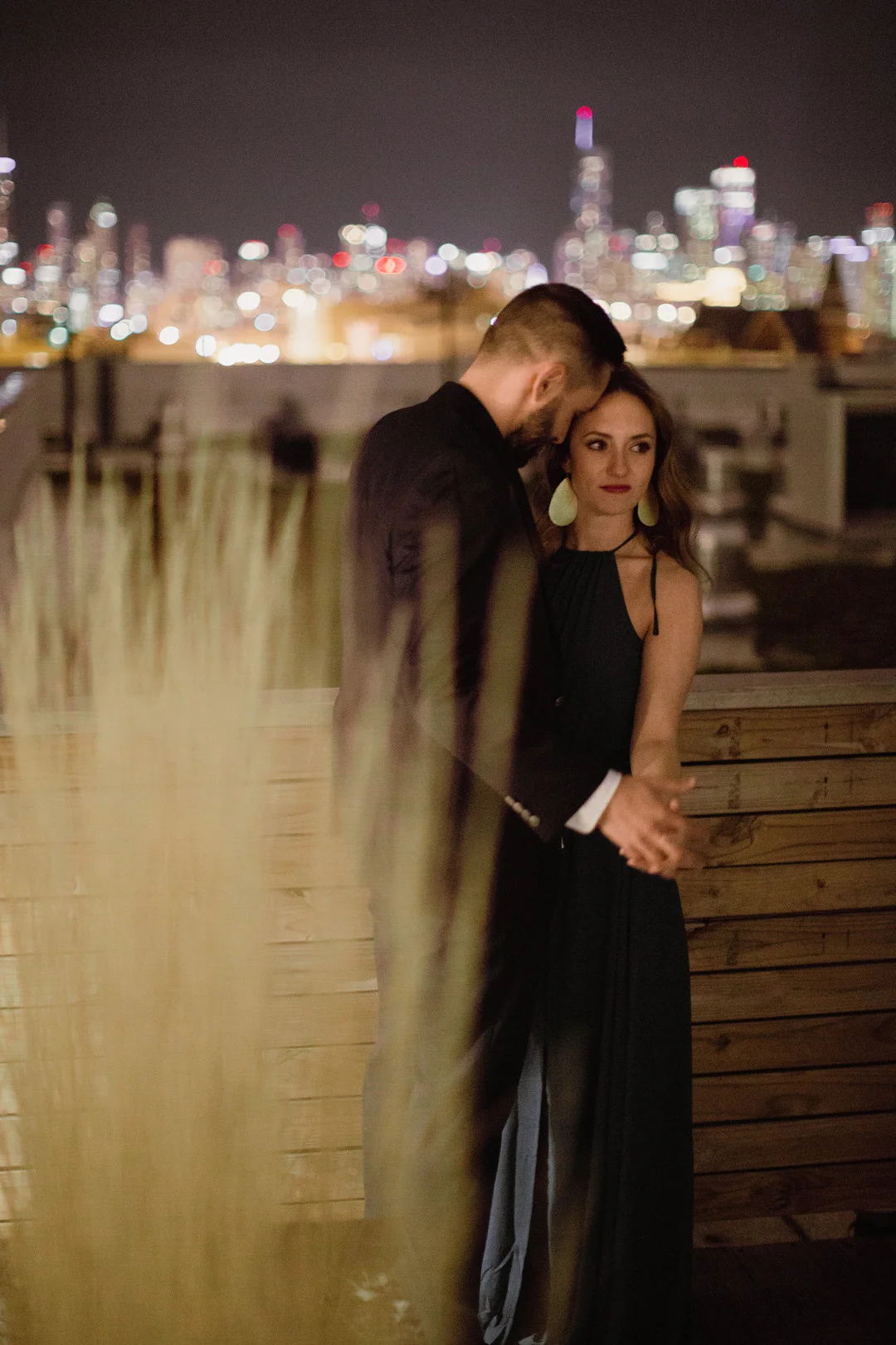 Evening Chicago engagement session captured by Robyn and Finch. See more engagement photo ideas on CHItheeWED.com!