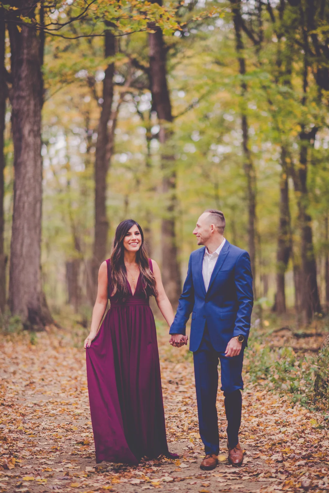 Romantic fall forest engagement session captured by Kara Evans Photographer. See more engagement photo ideas at CHItheeWED.com!