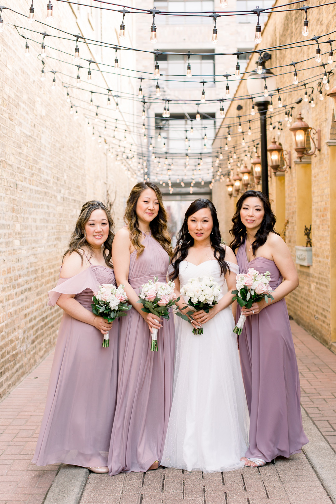 Purple bridesmaids dresses: Spring wedding inspiration captured by Nicole Morisco Photography. Find more spring wedding ideas at CHItheeWED.com!