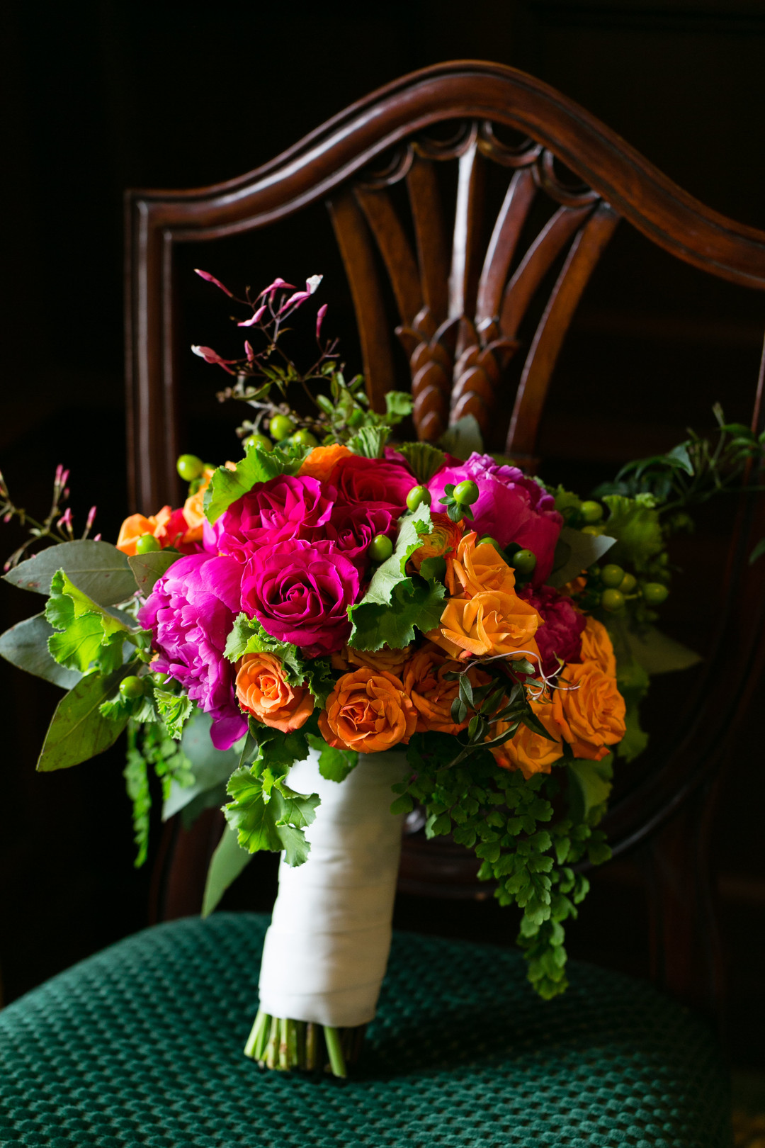 Pink and orange wedding bouquet: Vibrant and Historic Chicago Wedding with a Second Line Band captured by Emilia Jane Photography. See more unique wedding ideas on CHItheeWED.com!