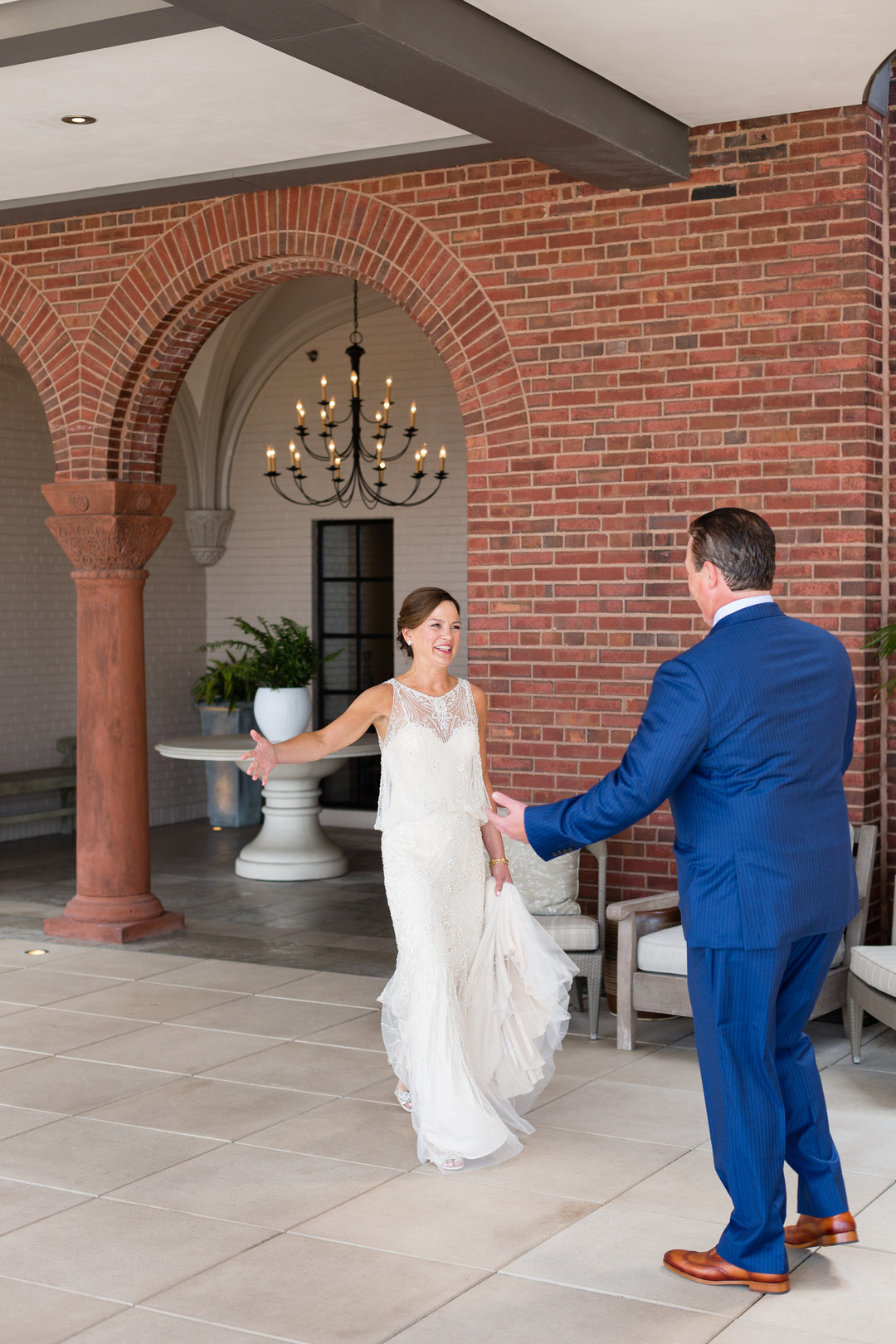 Chicago wedding first look: Vibrant and Historic Chicago Wedding with a Second Line Band captured by Emilia Jane Photography. See more unique wedding ideas on CHItheeWED.com!