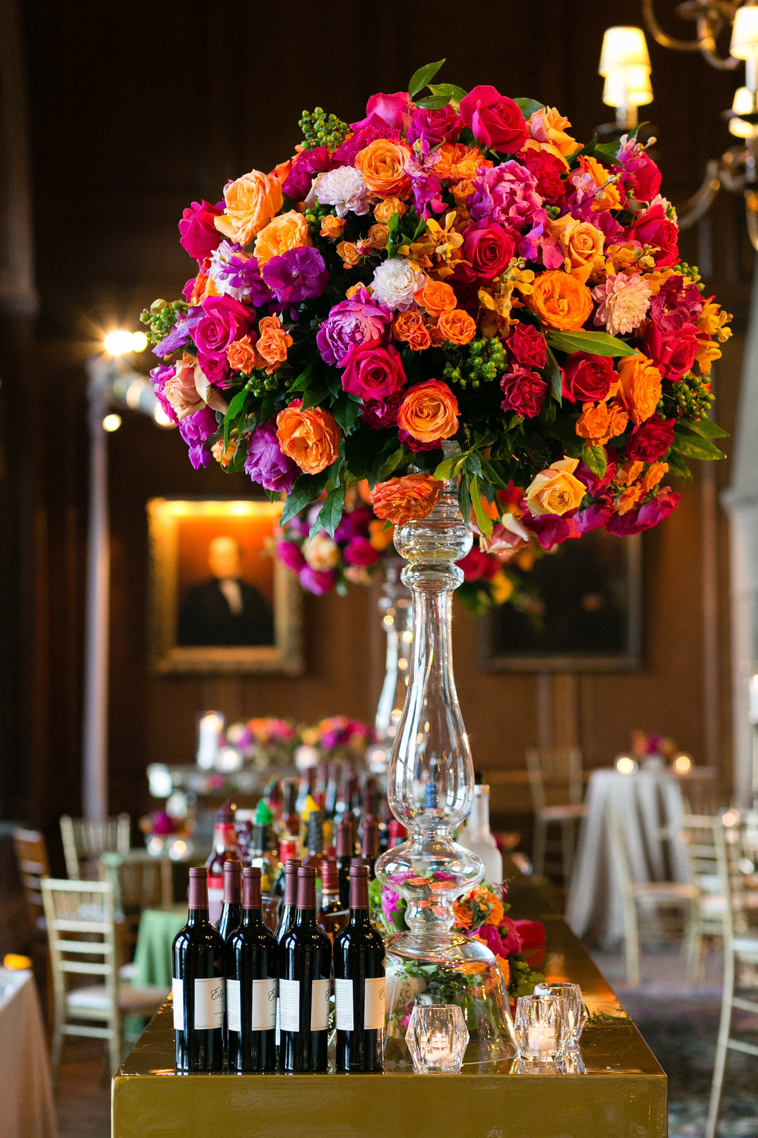 Tall colorful wedding centerpieces: Vibrant and Historic Chicago Wedding with a Second Line Band captured by Emilia Jane Photography. See more unique wedding ideas on CHItheeWED.com!
