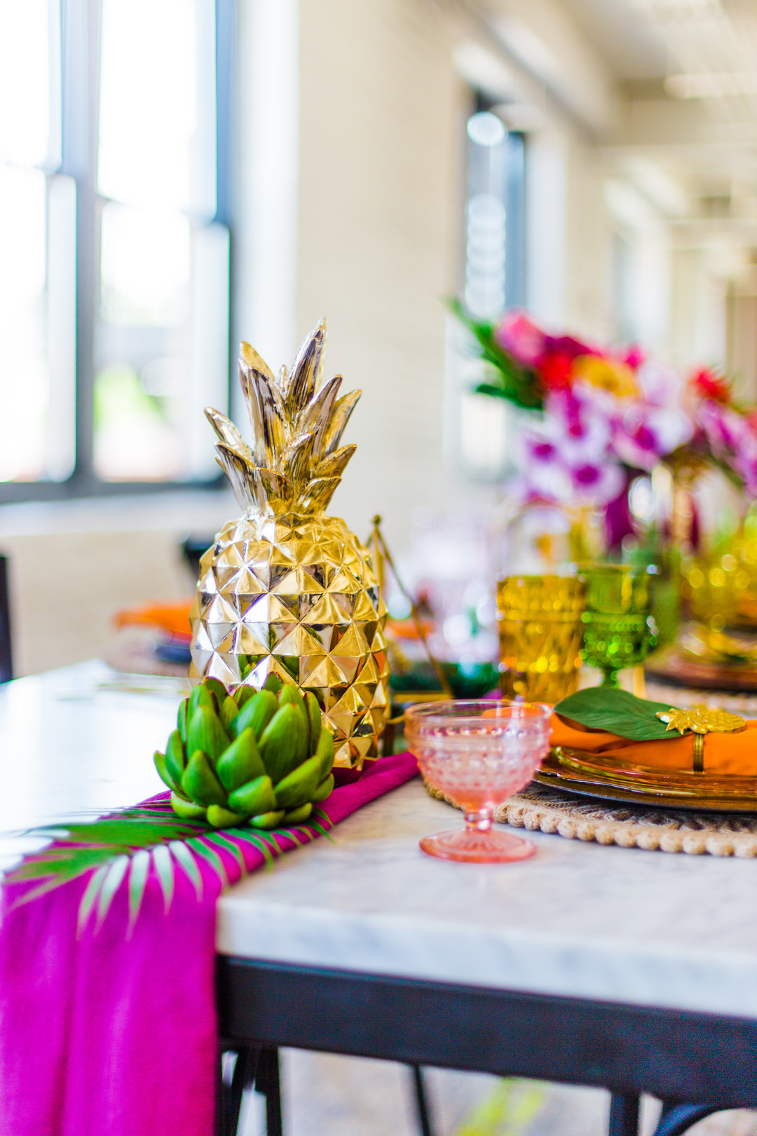 Pineapple wedding table decor: Tropical Eclectic Wedding Inspiration captured by Grace Rios Photography featured on CHI thee WED. See more colorful wedding ideas at CHItheeWED.com!