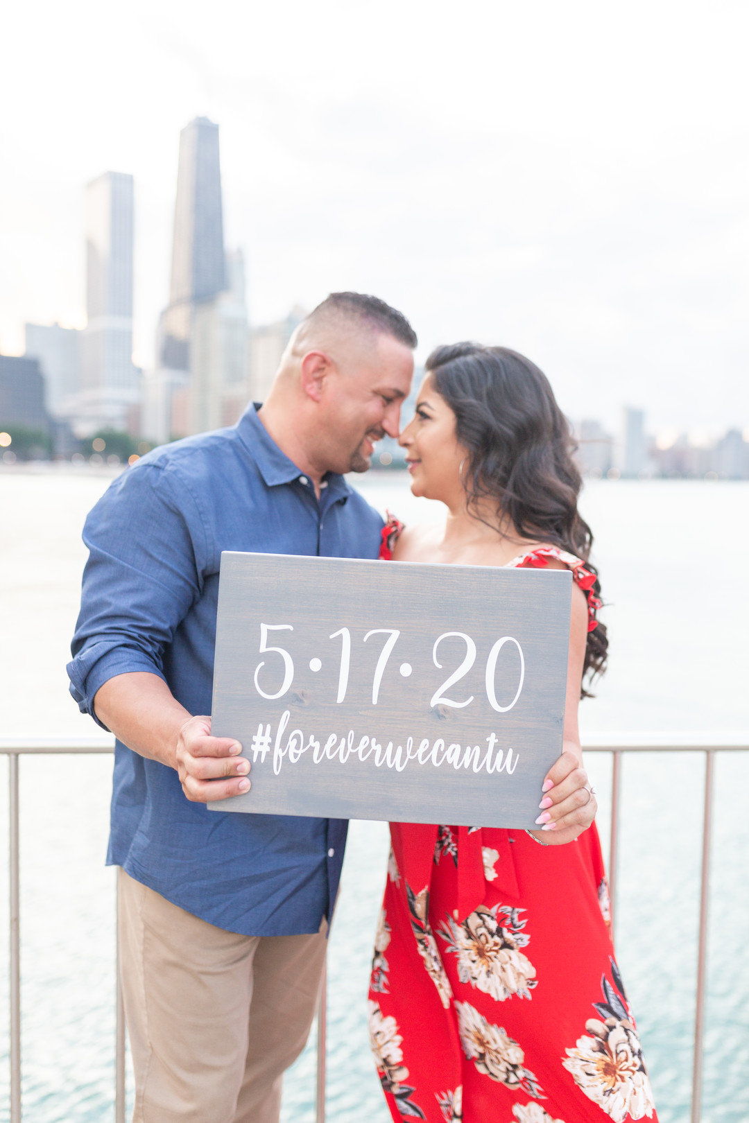 Chicago skyline engagement session captured by Emma Belen Photography. See more engagement photo ideas featured on CHItheeWED.com!