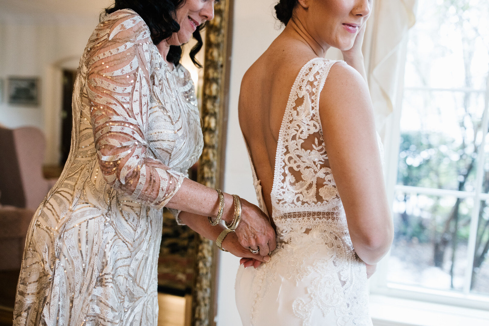 Lace wedding dress details: Chicago spring wedding captured by Hannah Rose Gray Photography. See more timeless wedding ideas on CHItheeWED.com!