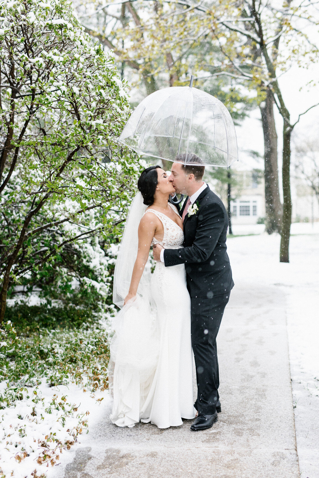 Snowy wedding day photo ideas: Chicago spring wedding captured by Hannah Rose Gray Photography. See more timeless wedding ideas on CHItheeWED.com!