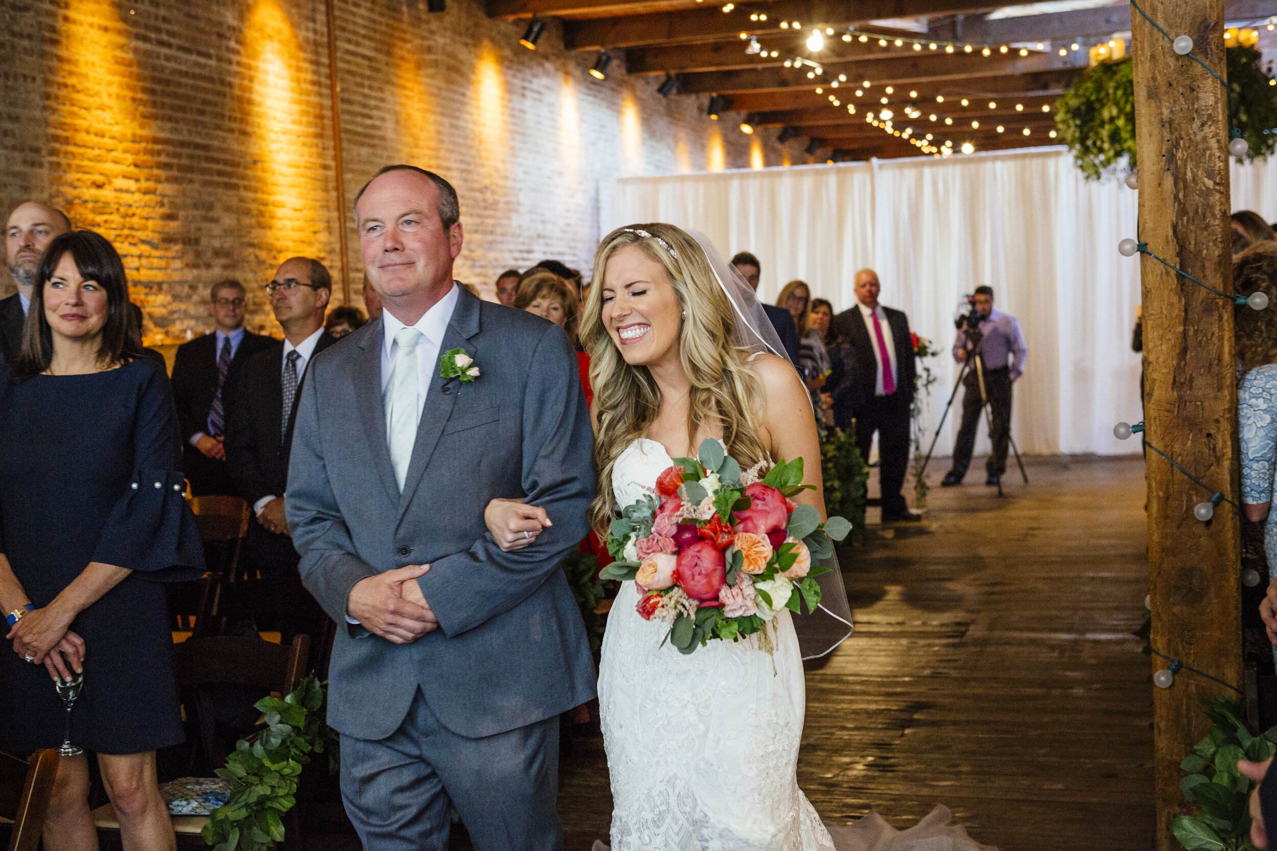 Colorful Chicago loft wedding captured by I Luv Photo. See more loft wedding ideas featured on CHItheeWED.com!