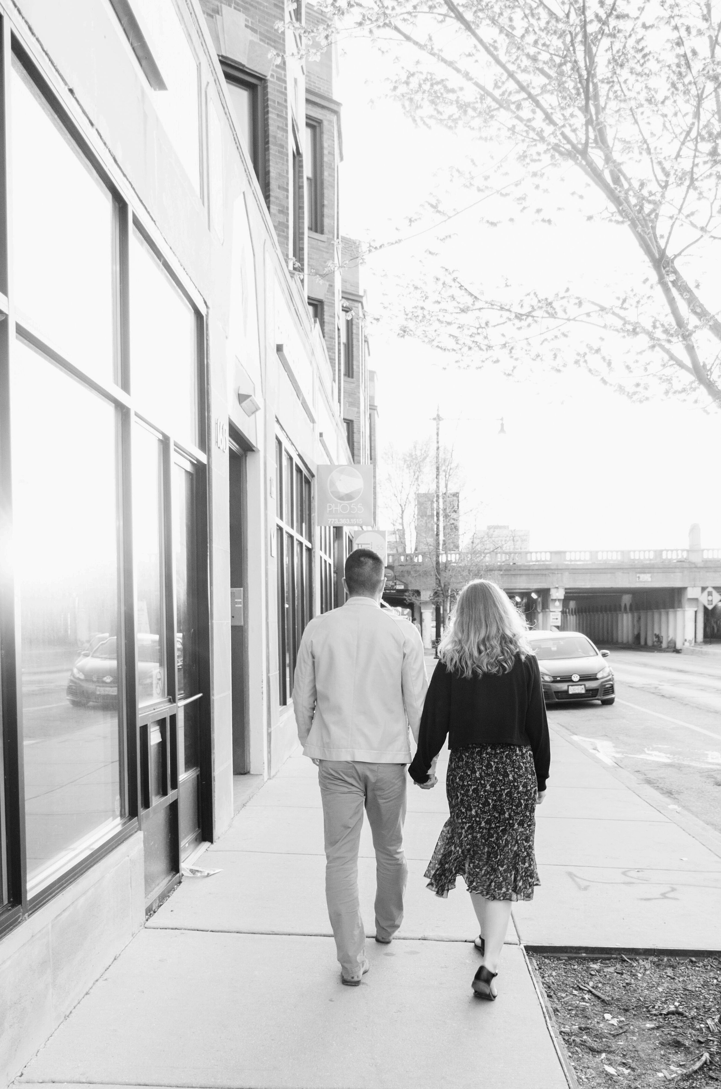 Spring Engagement on the Outskirts of Downtown Chicago captured by K. Marie Studios. See more engagement photo ideas on CHItheeWED.com! 