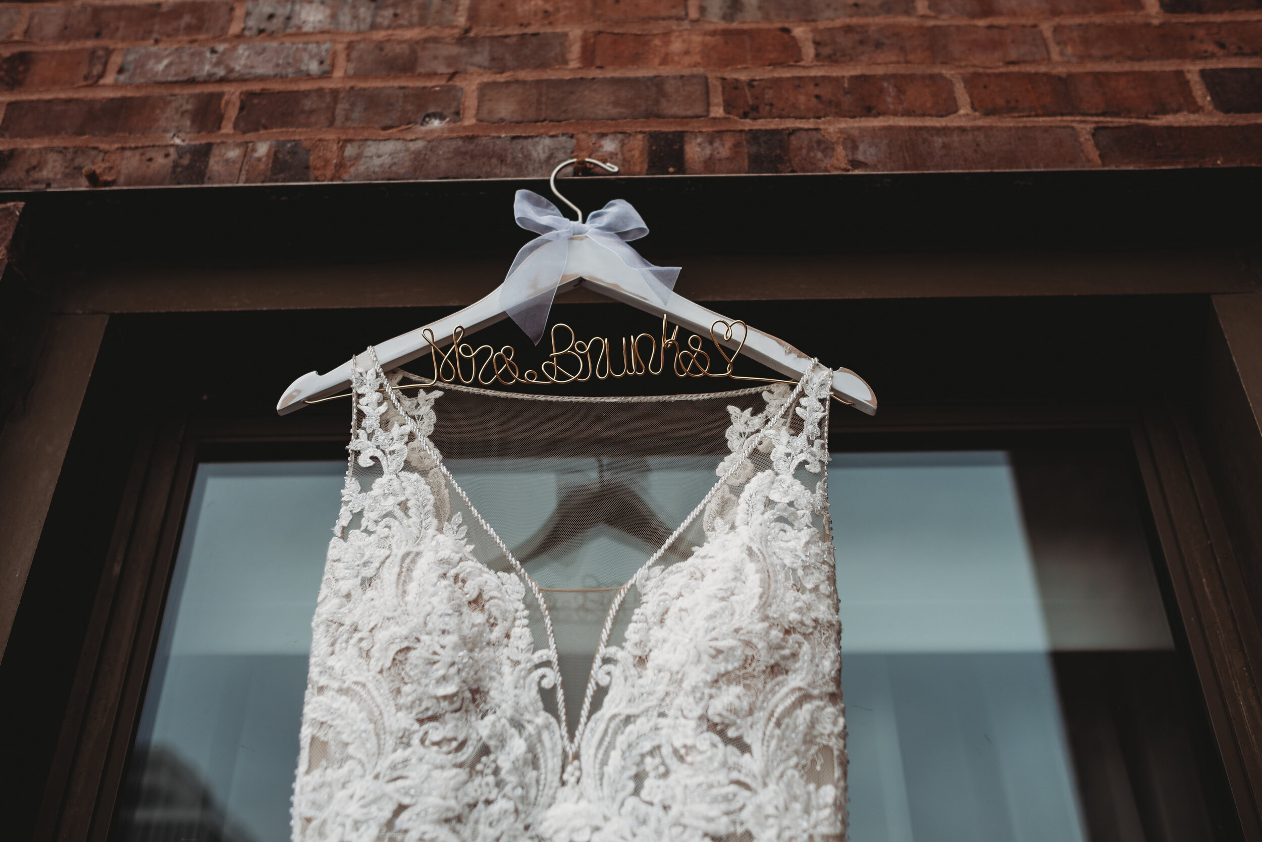 Wedding Dress Hanger: Modern Chic Chicago History Museum Wedding captured by Girl with the Tattoos. See more wedding ideas at CHItheeWED.com!