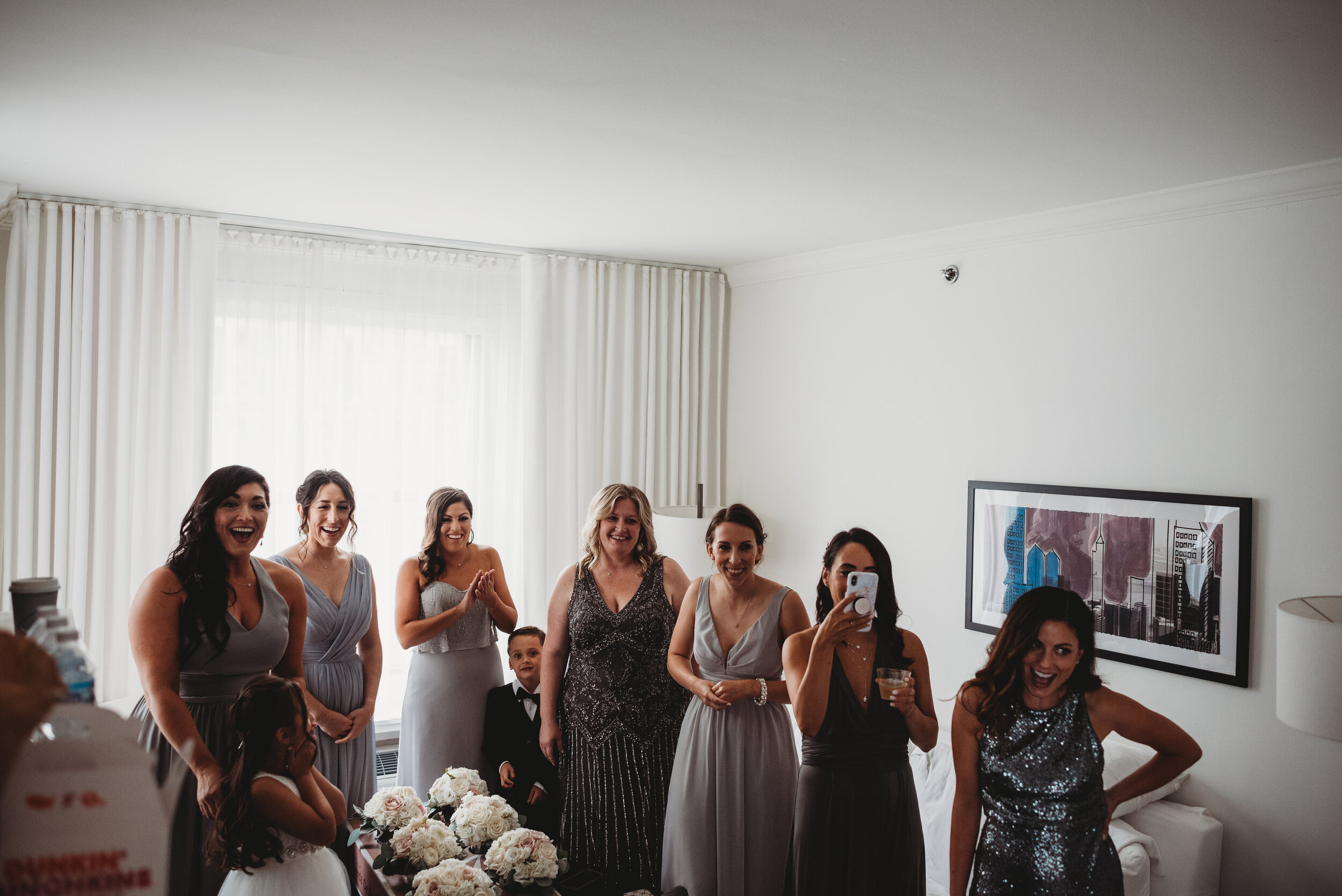 Bridesmaids reaction to wedding dress: Modern Chic Chicago History Museum Wedding captured by Girl with the Tattoos. See more wedding ideas at CHItheeWED.com!