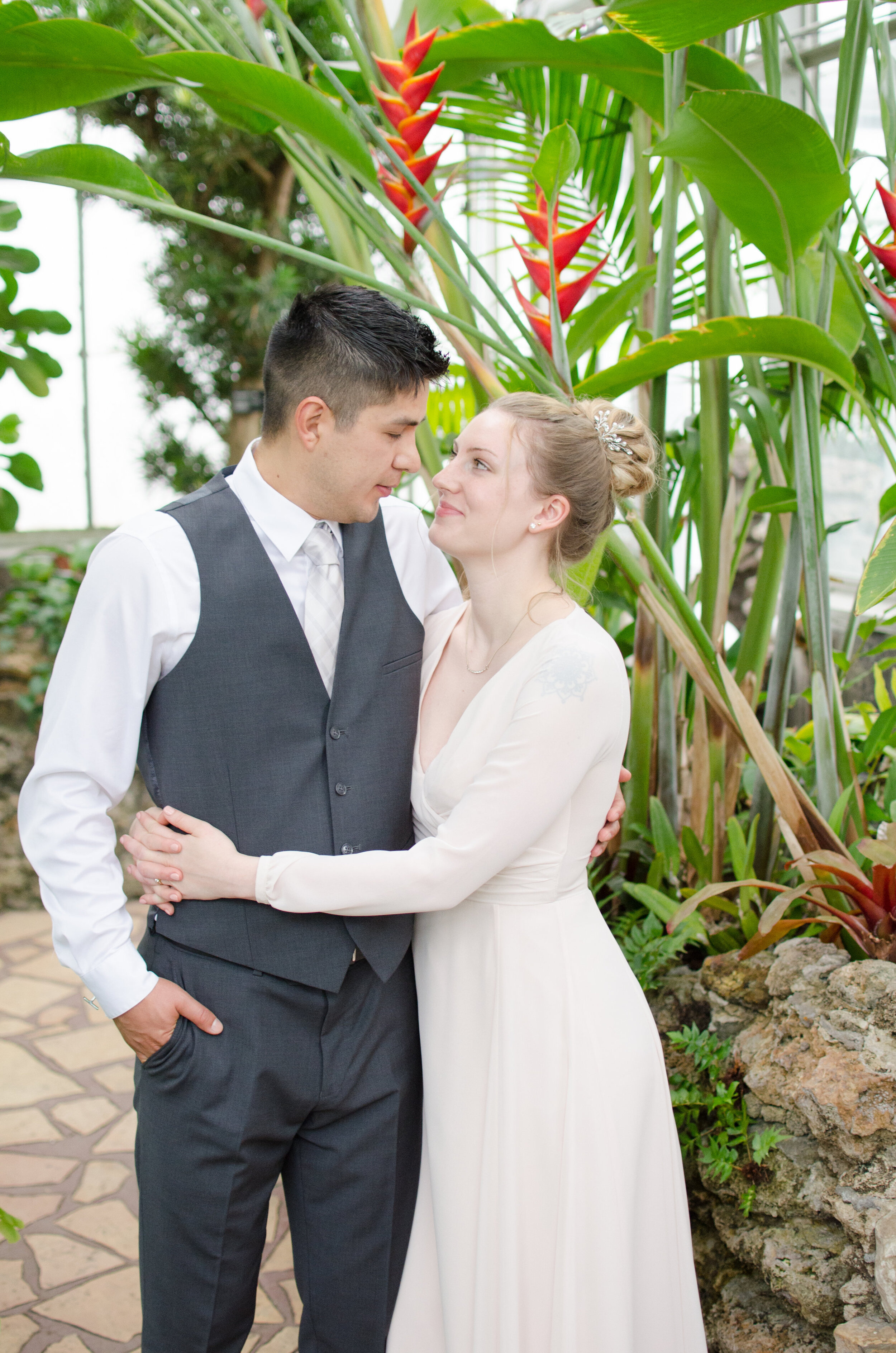 Intimate Oak Park Conservatory Greenhouse Wedding captured by K. Marie Studios. Head to CHItheeWED.com for more wedding ideas!