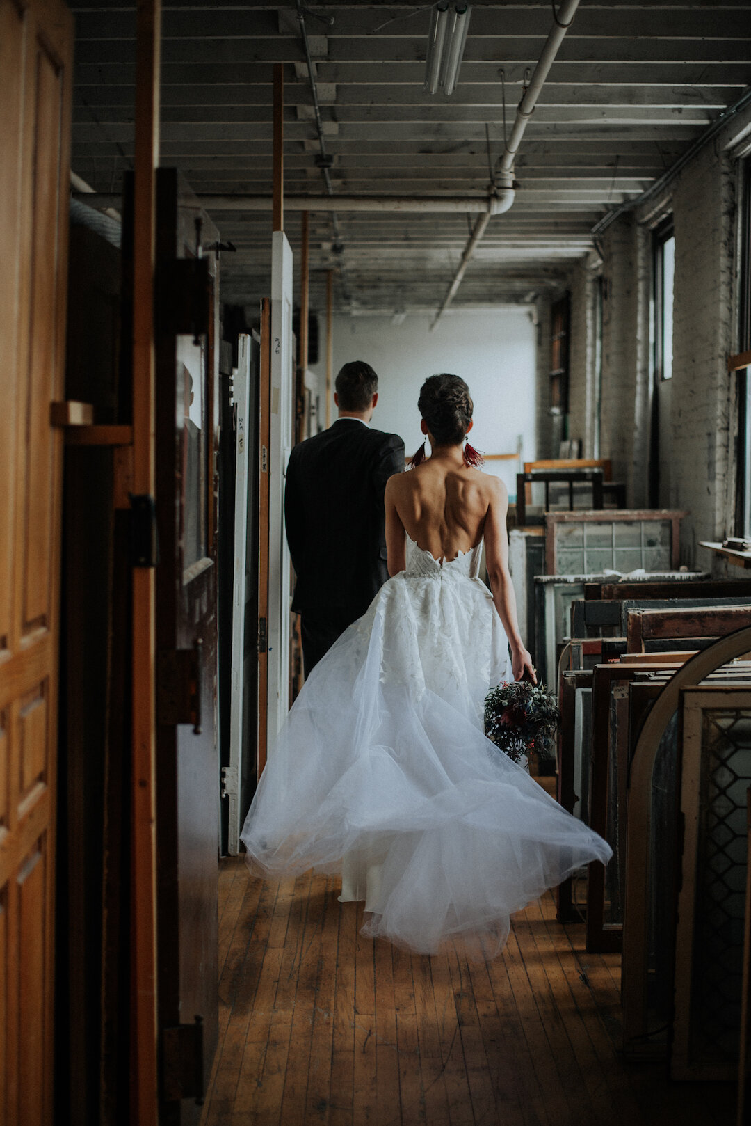 Gothic Romance in Three Story Vintage Warehouse captured by Allie Appeal and styled by Ariana Anderson featured on CHI thee WED. See more moody wedding ideas at CHItheeWED.com!
