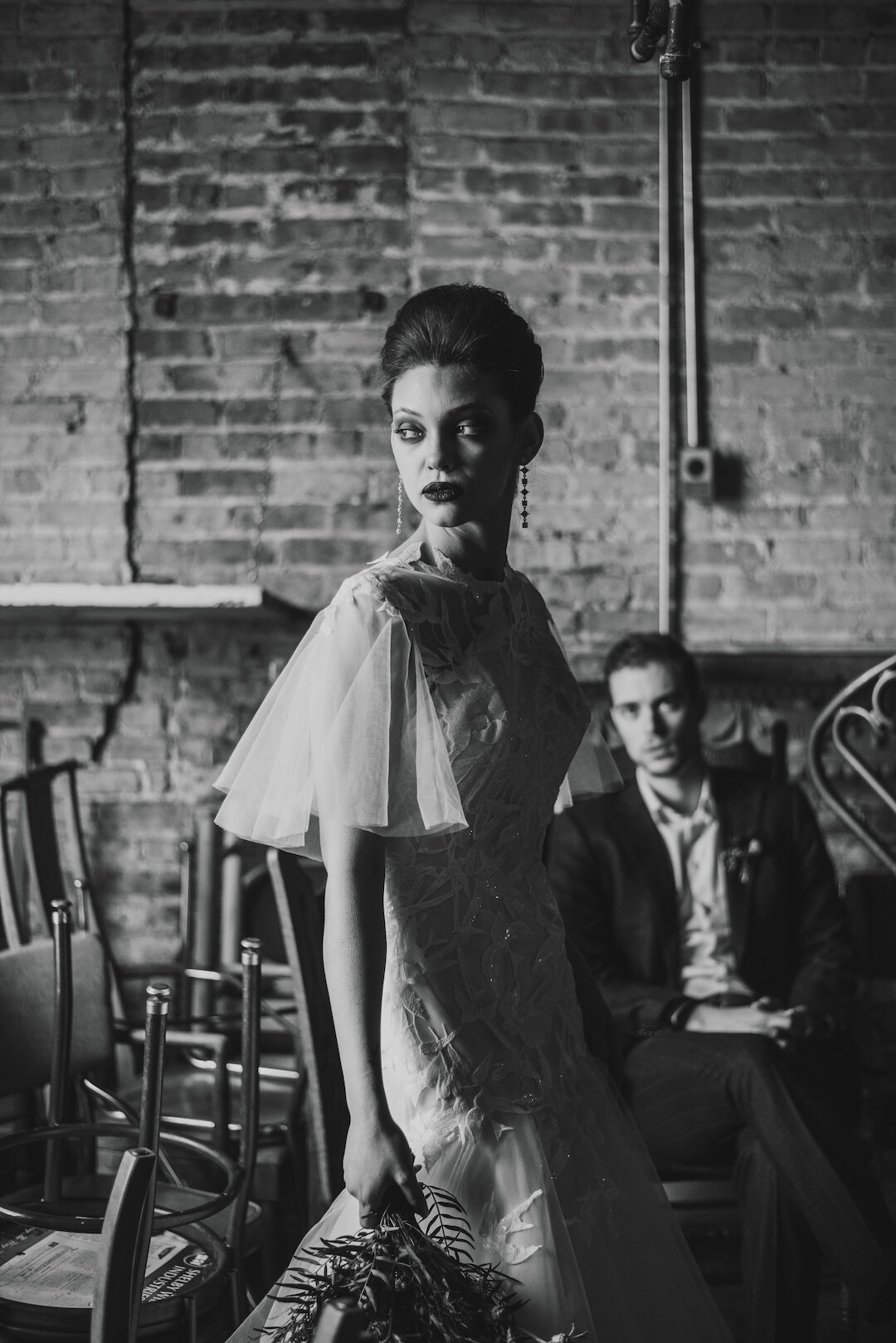 Gothic Romance in Three Story Vintage Warehouse captured by Allie Appeal and styled by Ariana Anderson featured on CHI thee WED. See more moody wedding ideas at CHItheeWED.com!