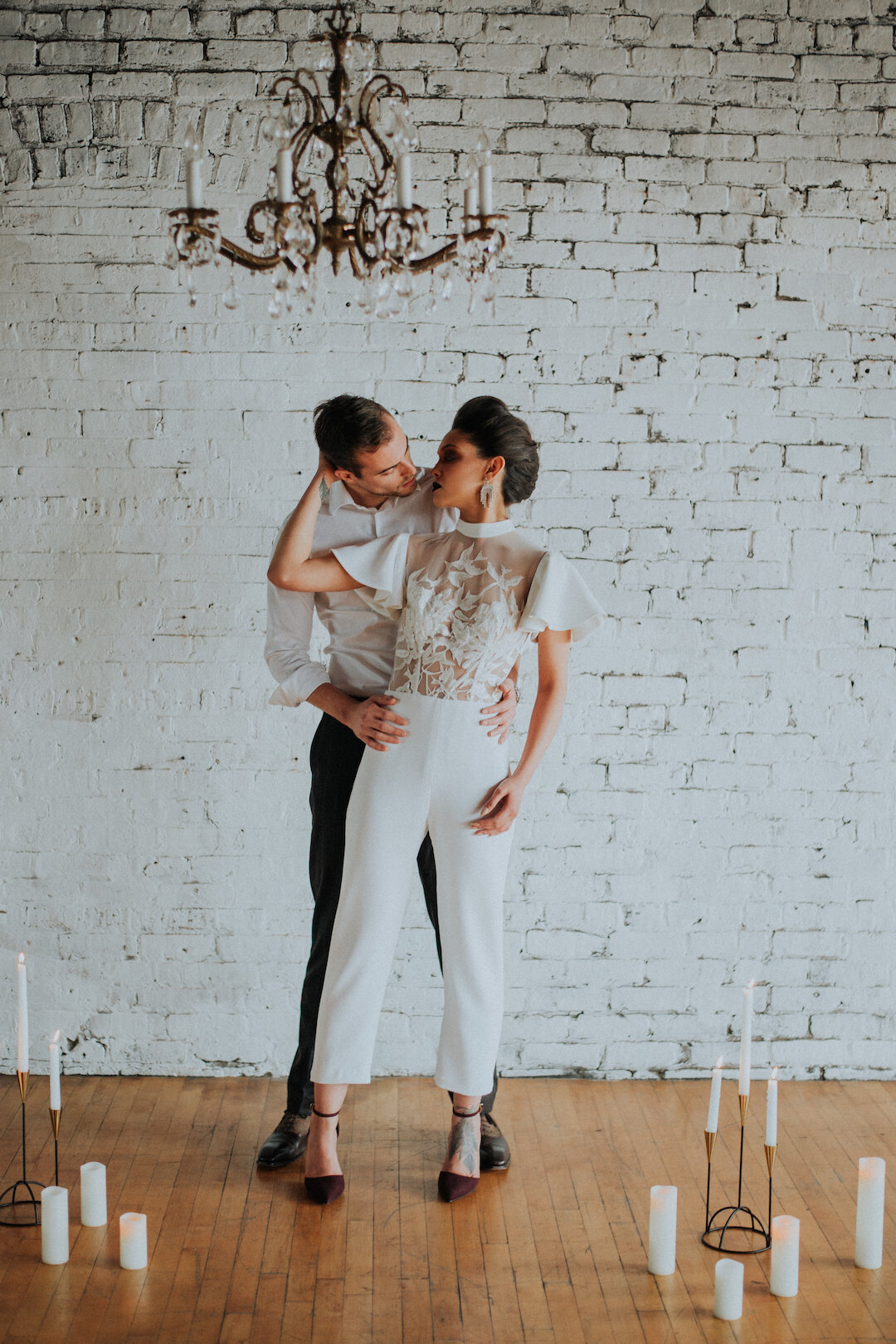 Gothic Romance in Three Story Vintage Warehouse captured by Allie Appeal and styled by Ariana Anderson featured on CHI thee WED. See more moody wedding ideas at CHItheeWED.com!