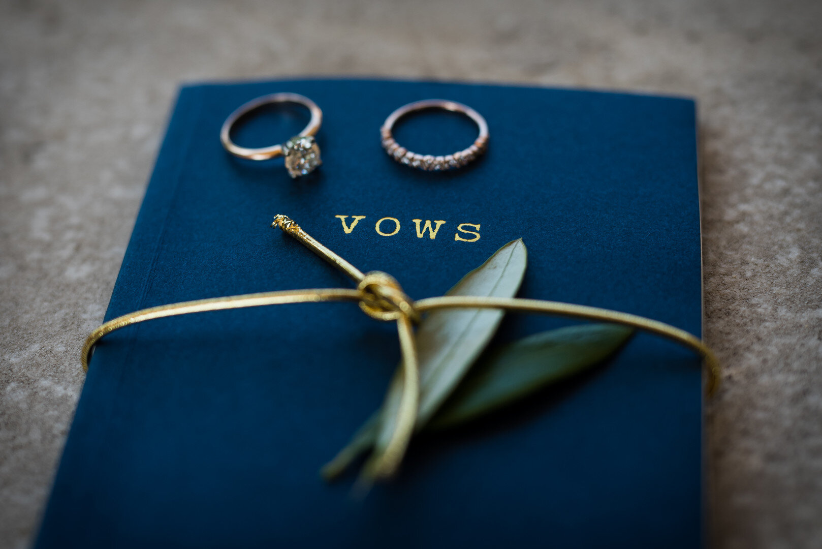 Blue wedding vow book: Golden Hour Armour House Chicago Wedding captured by Inspired Eye Photography featured on CHI thee WED. Find more wedding ideas at CHItheeWED.com!
