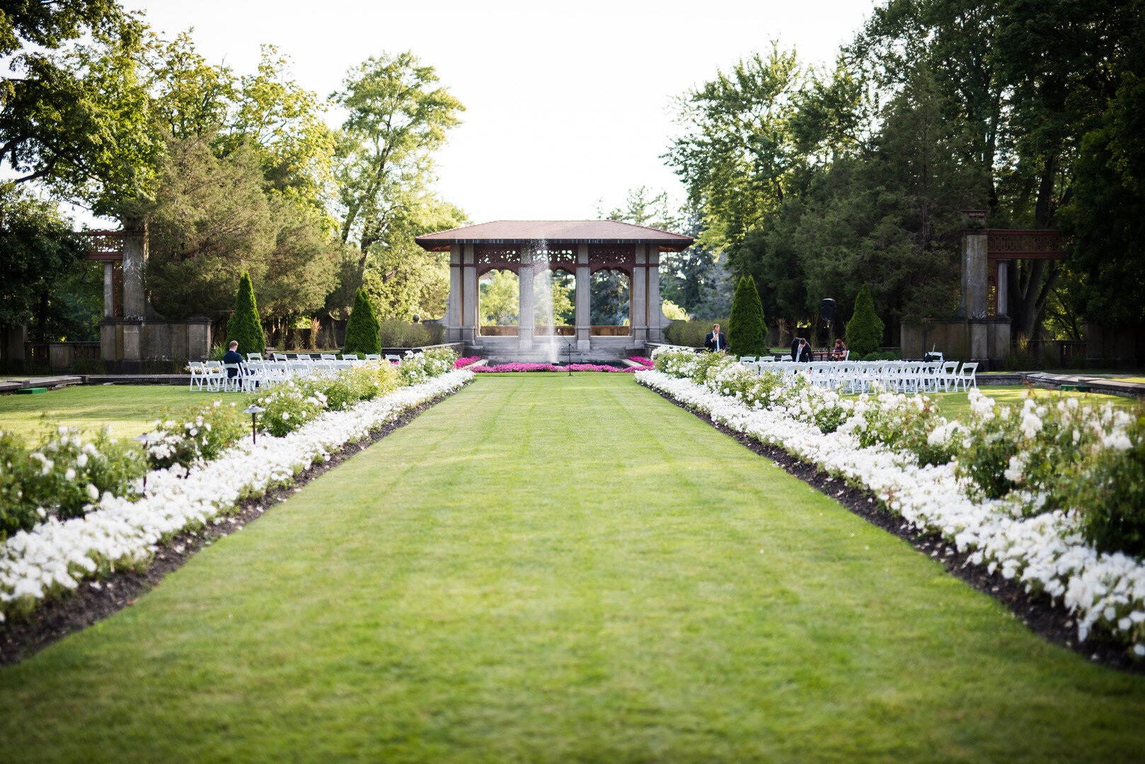 Outdoor wedding ceremony: Golden Hour Armour House Chicago Wedding captured by Inspired Eye Photography featured on CHI thee WED. Find more wedding ideas at CHItheeWED.com!
