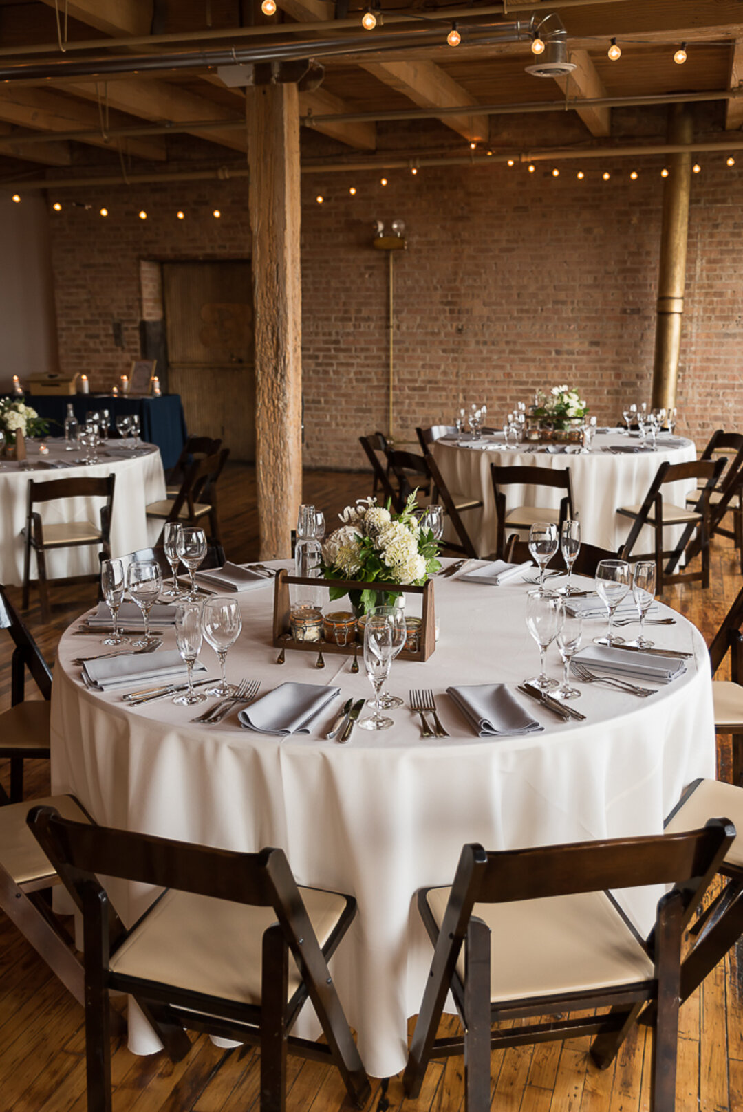 Wedding Table Decor: Lacuna Lofts Modern Day Jewish Wedding captured by Ashley Hamm Photography. See more modern wedding ideas at CHItheeWED.com!