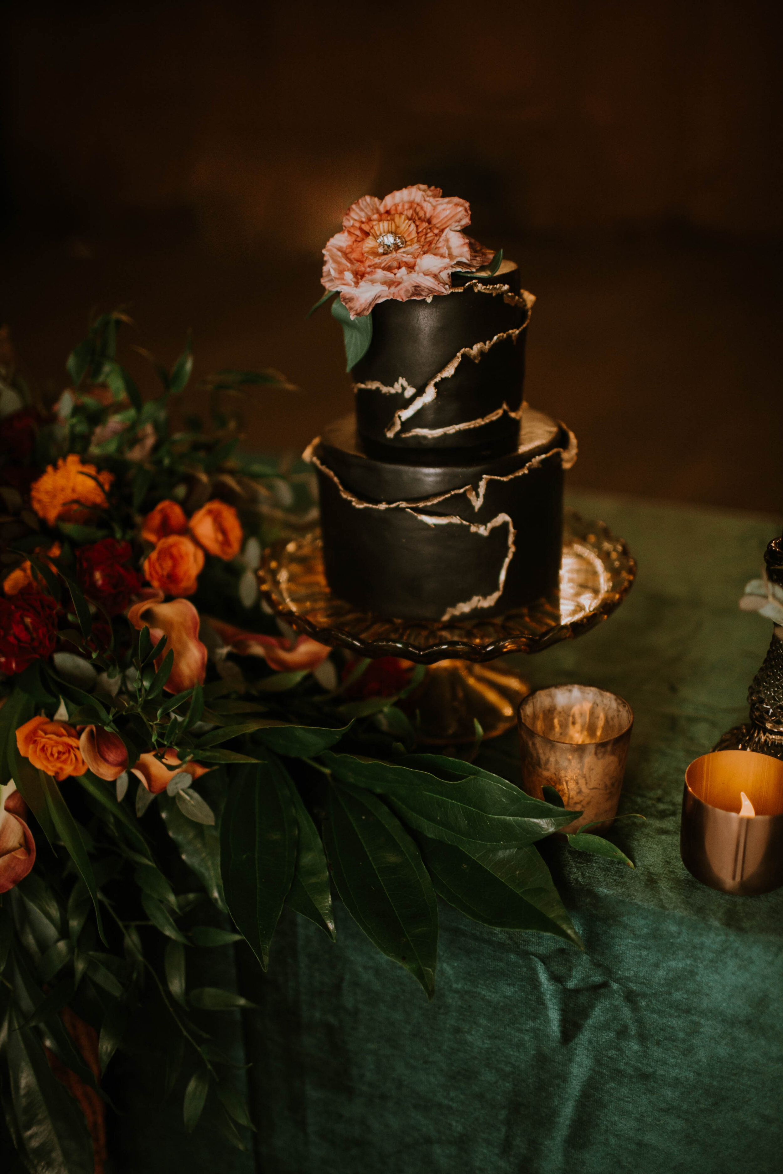 Modern black and gold wedding cake: Moody Fall Wedding Styled Shoot captured by Gabrielle Daylor Photography. See more fall wedding ideas at CHItheeWED.com!