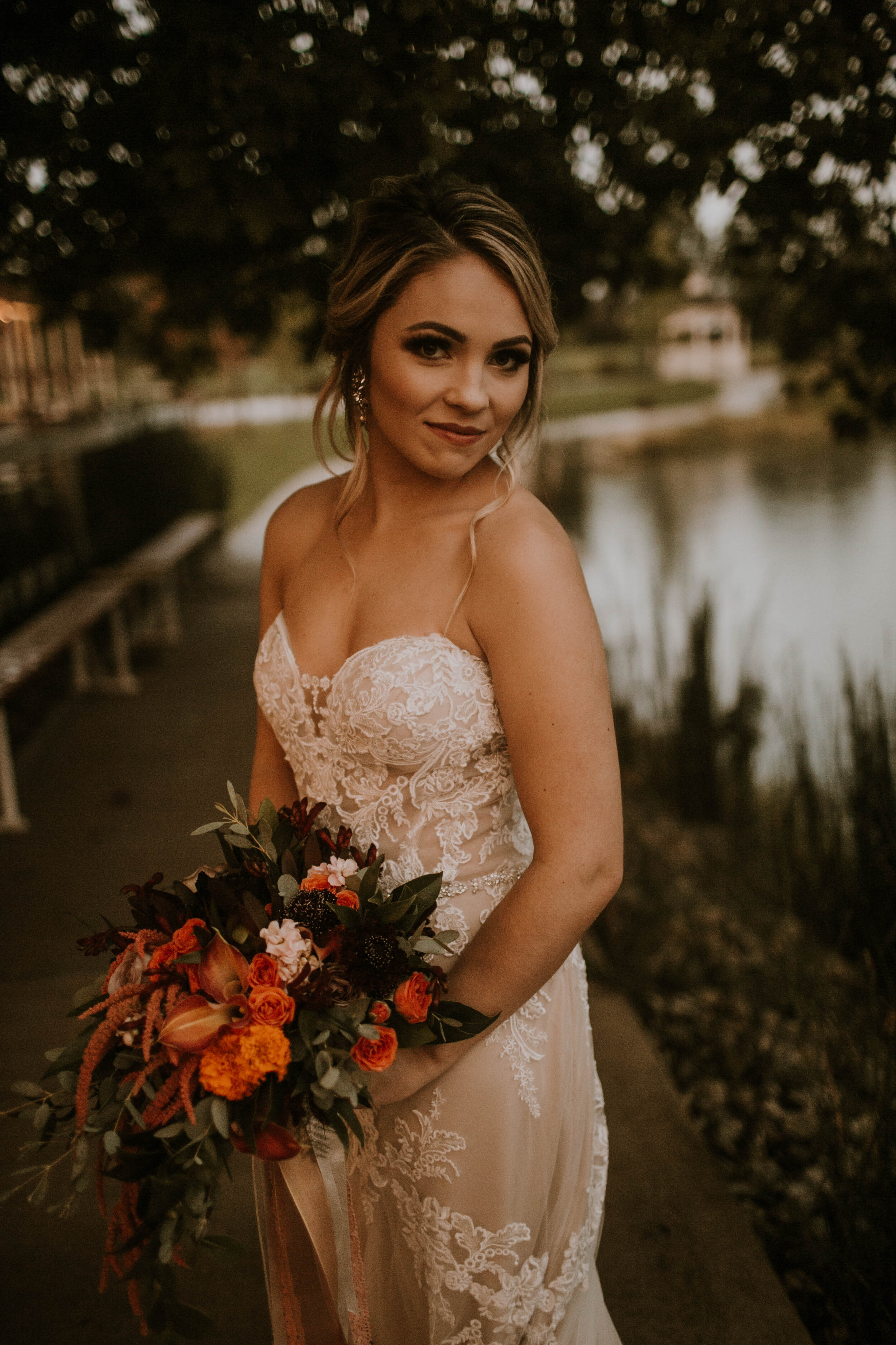 Strapless lace wedding dress: Moody Fall Wedding Styled Shoot captured by Gabrielle Daylor Photography. See more fall wedding ideas at CHItheeWED.com!