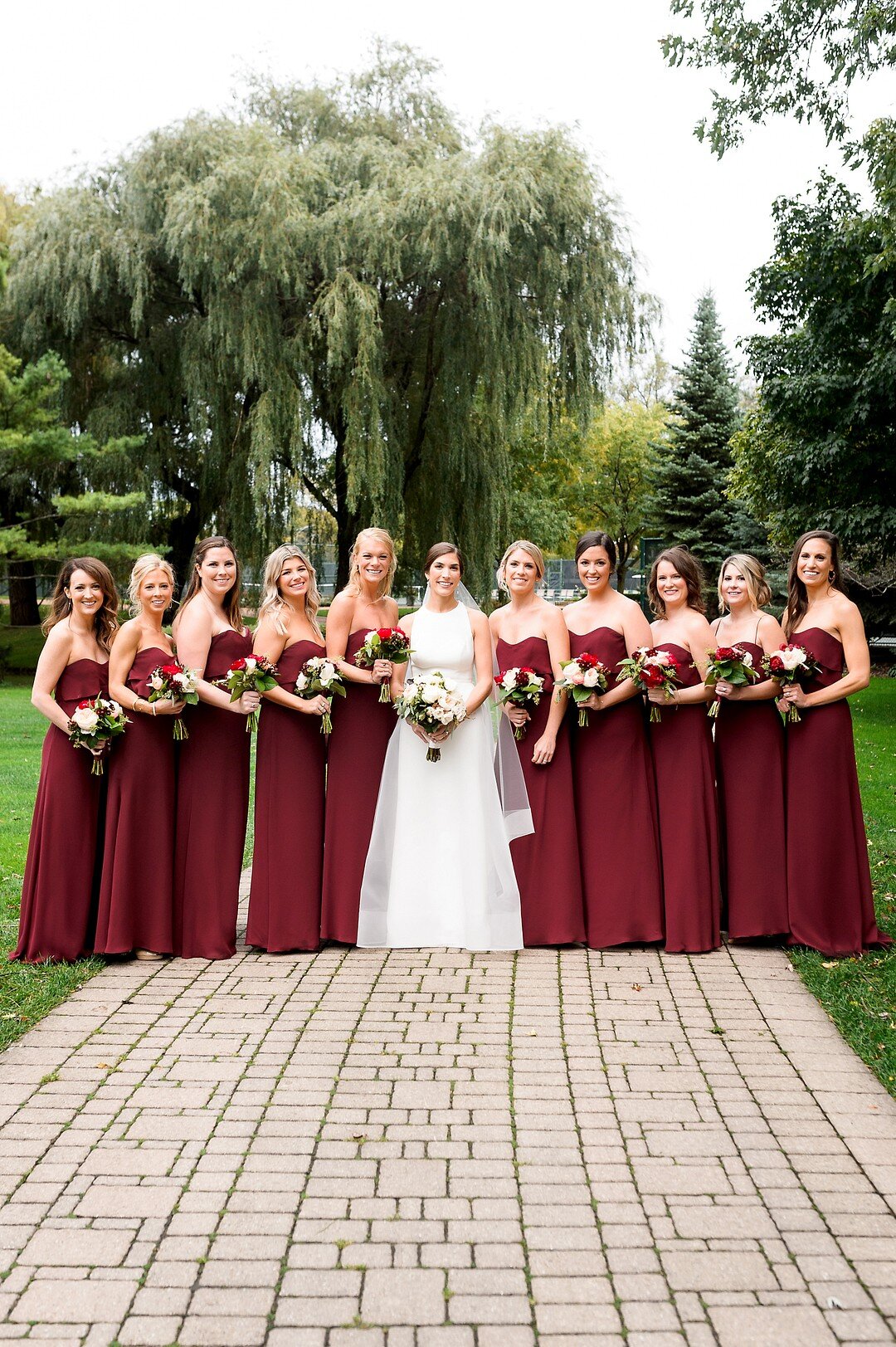 Classic and Romantic Chicago Wedding with Pops of Burgundy captured by Julia Franzosa Photography. See more timeless wedding ideas at CHItheeWED.com!