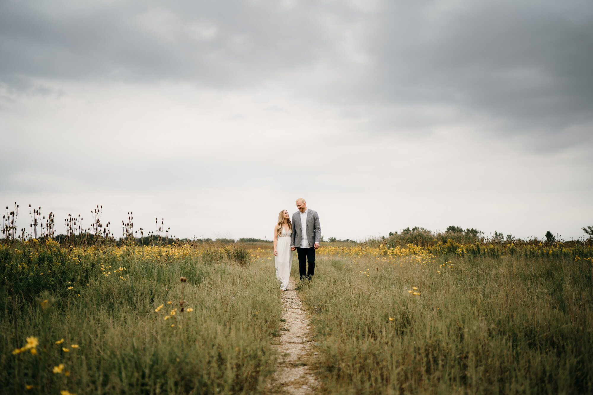 Romantic Late Summer Meadow Engagement Session captured by Kevin Kienitz Photography featured on CHI thee WED