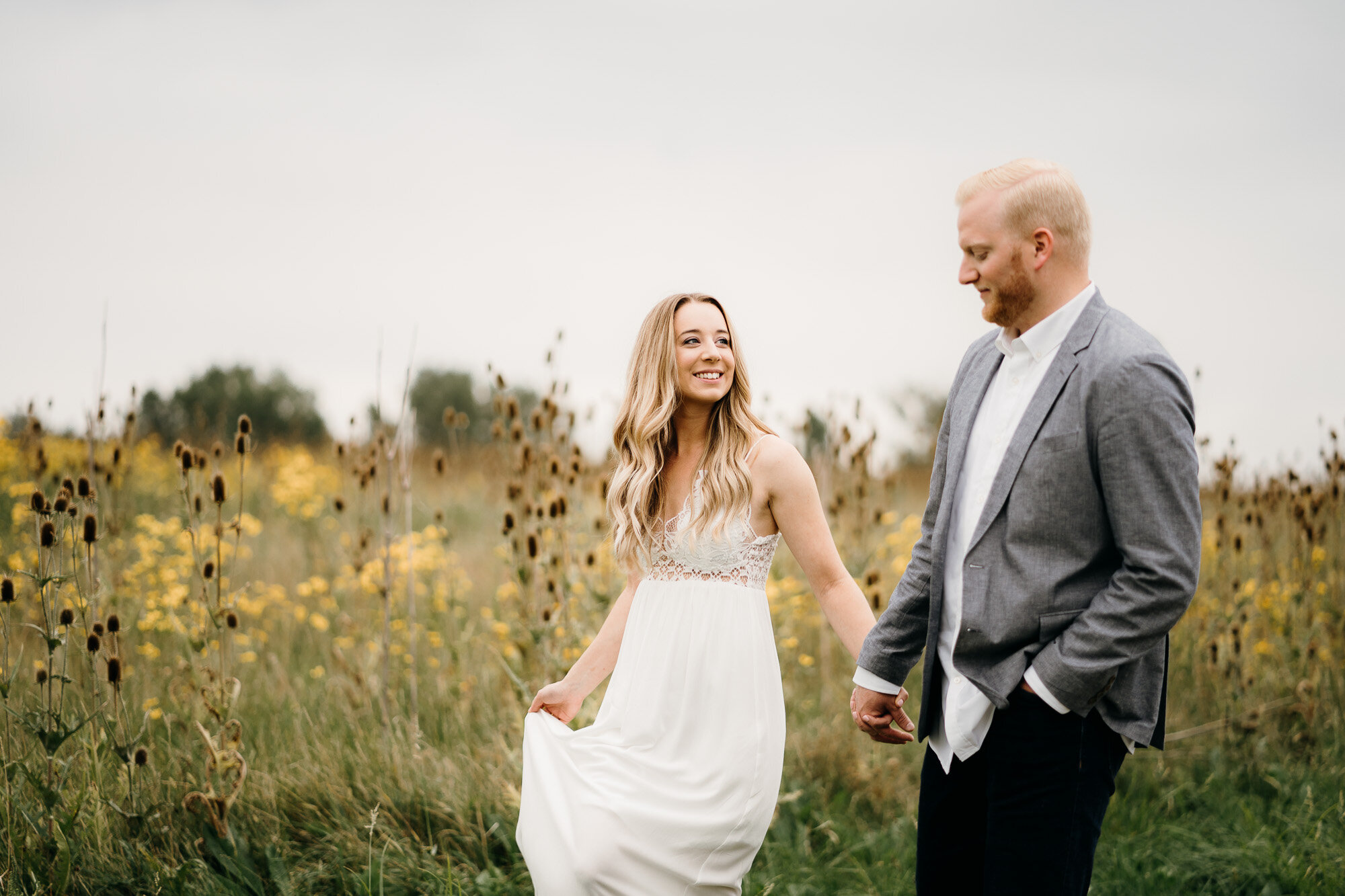 Romantic Late Summer Meadow Engagement Session captured by Kevin Kienitz Photography featured on CHI thee WED