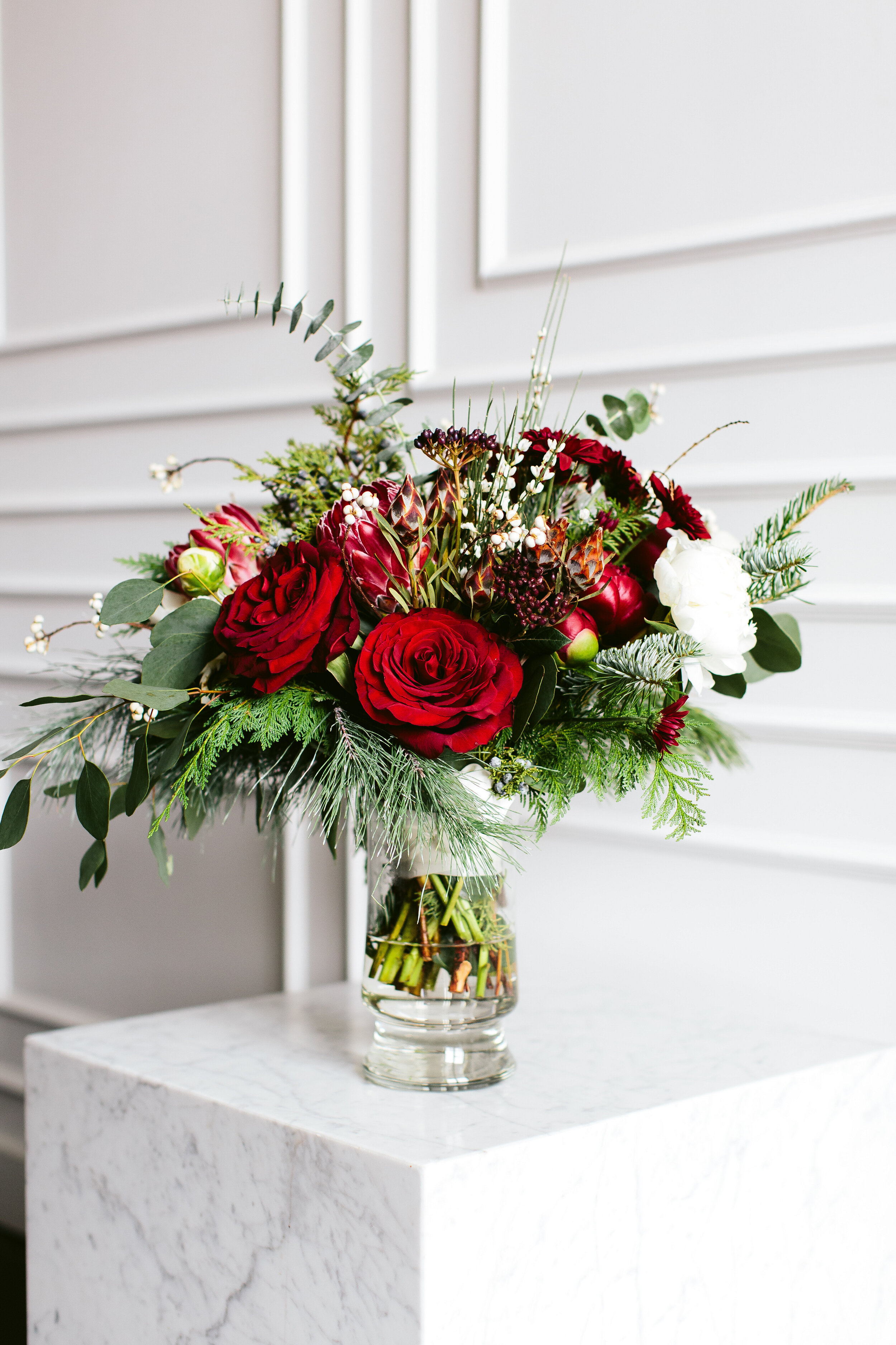 Red wedding bouquet: Luxury Winter Wonderland Wedding at Company 251 featured on CHI thee WED