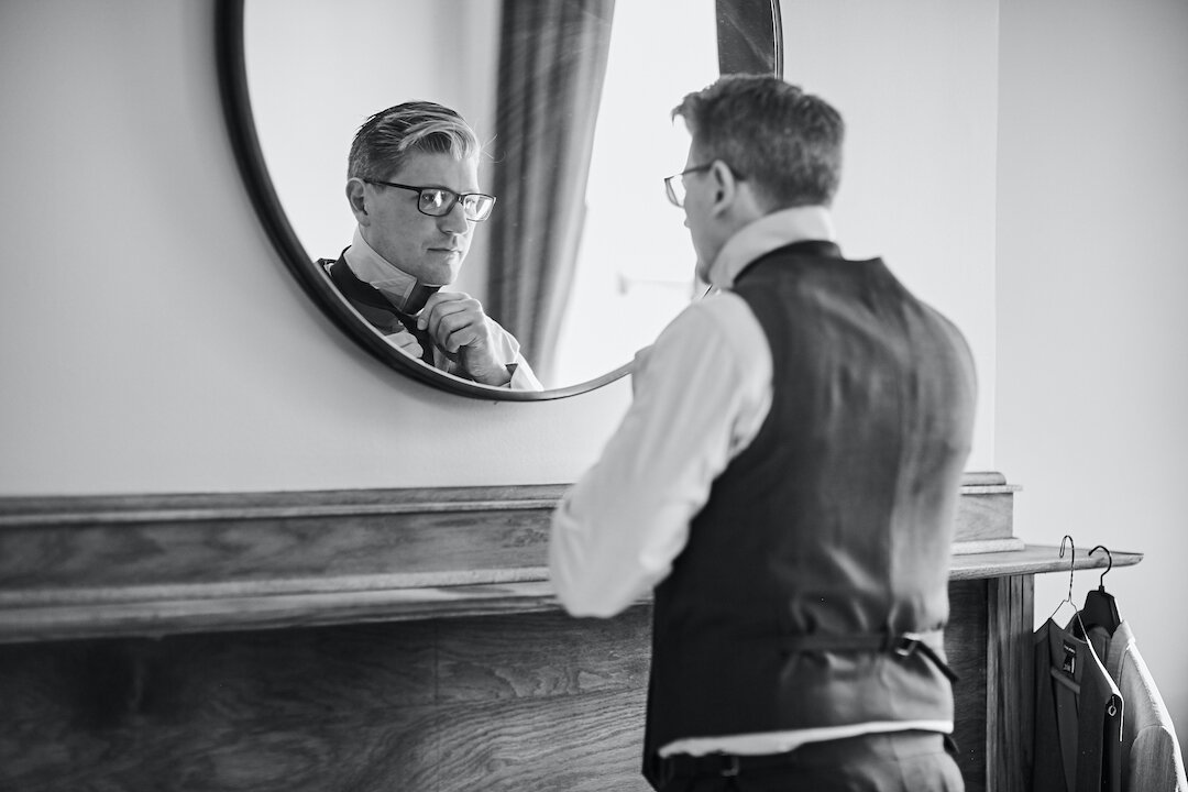 Groom getting ready: Leap Day Wedding from Wicker Park Inn on CHI thee WED captured by Pure Wedding Day Photography 