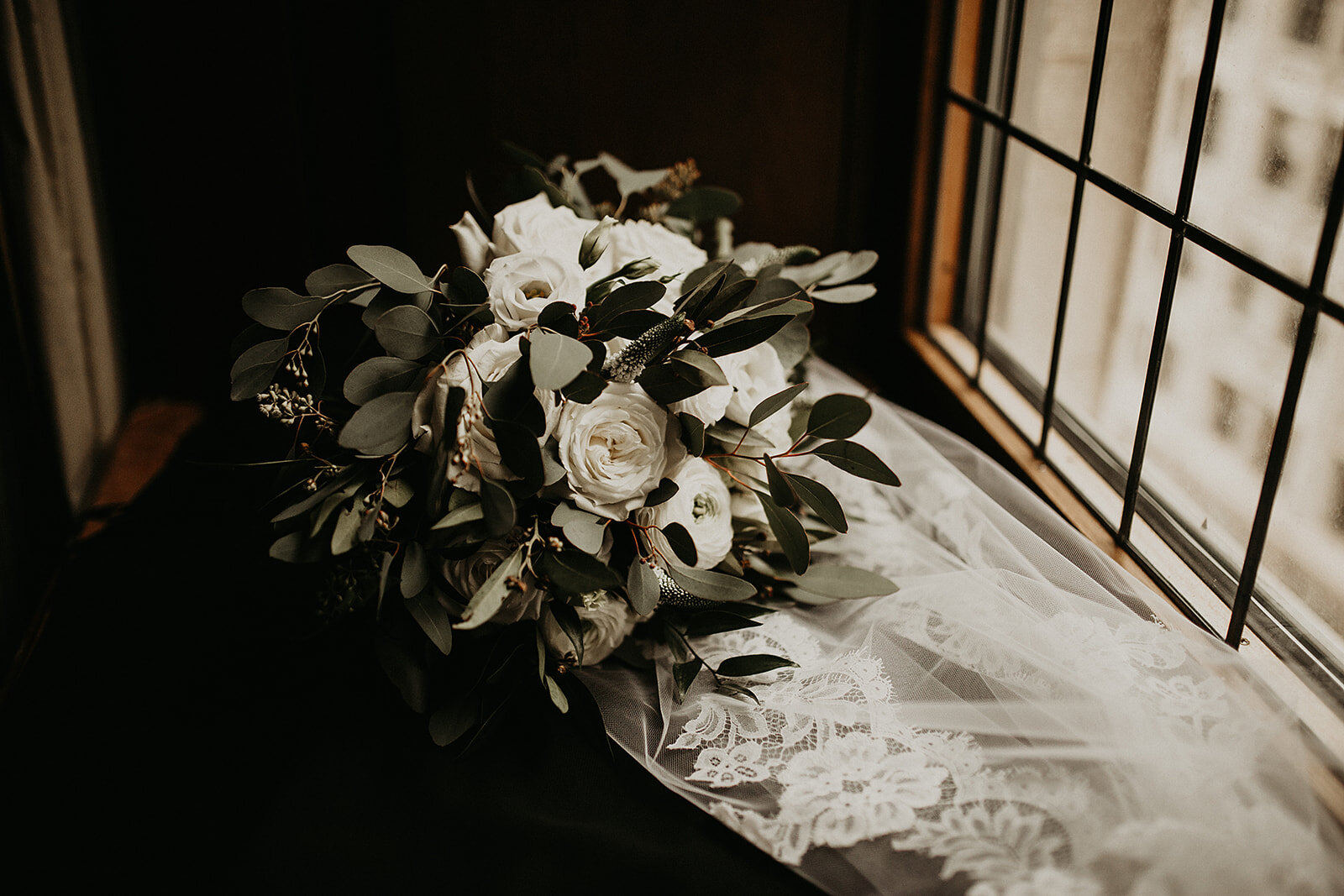 White and greenery floral wedding bouquet: Dreamy Winter Wedding at University Club Chicago by The Simply Elegant Group featured on CHI thee WED