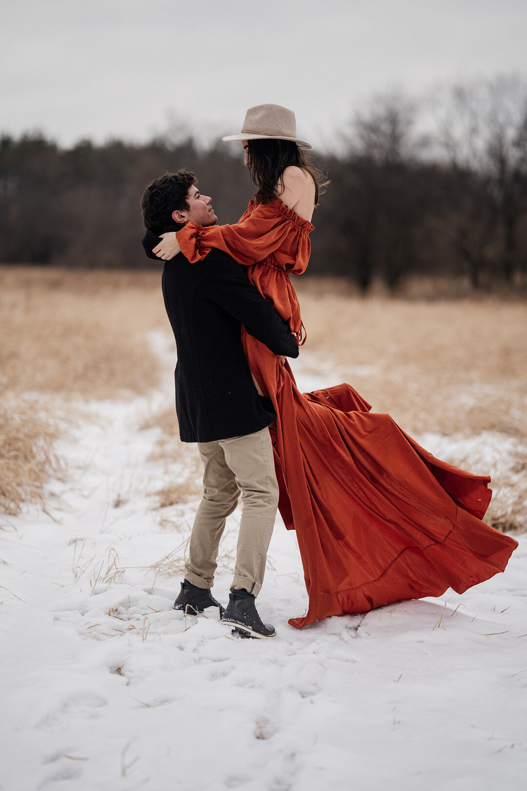 Snowy Engagement Session at Waterfall Glen captured by Millennium Moments