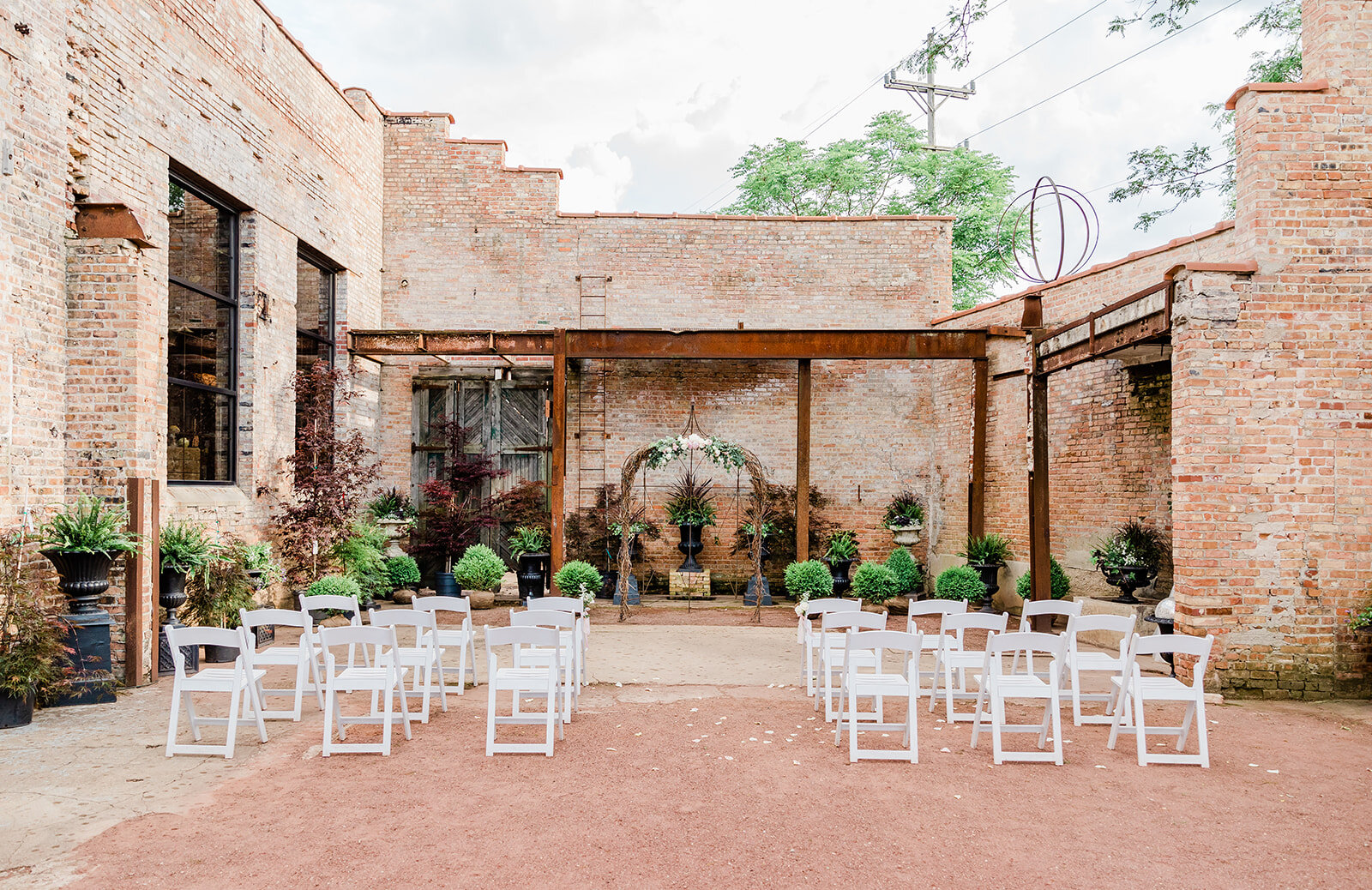 Romantic Industrial Summer Wedding Filled with Peonies in Sycamore Illinois captured by Expedition Joy