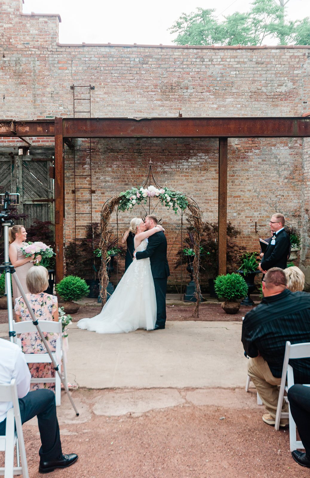 Romantic Industrial Summer Wedding Filled with Peonies in Sycamore Illinois captured by Expedition Joy