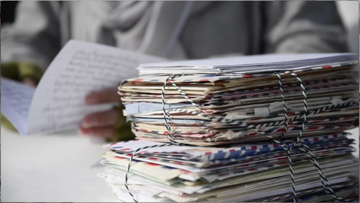 Lettres pour Yaya Mujinga; as read by her grandchild. 2015. Film still. Image Credit: Karl Schwiesow