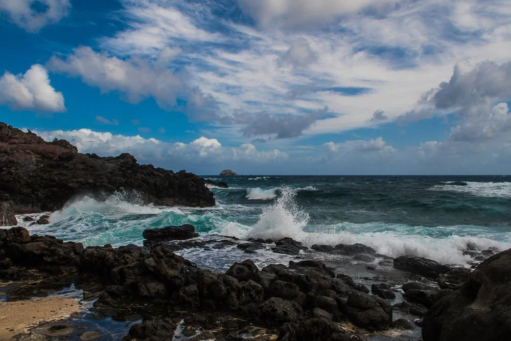Waves crashing coastline