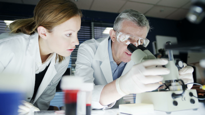 scientists-use-microscopes-in-a-laboratory_71fqsfw7k__F0000.png