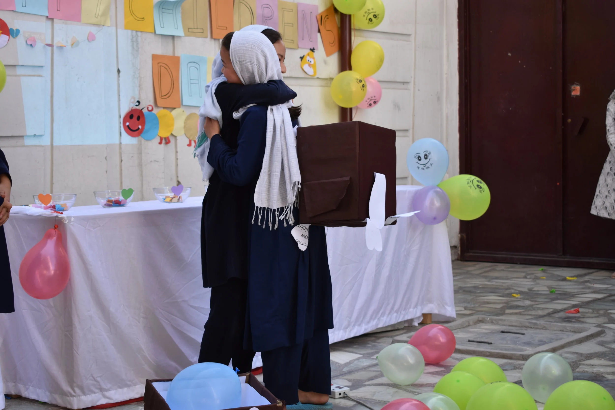 hug with box GOOD.JPG