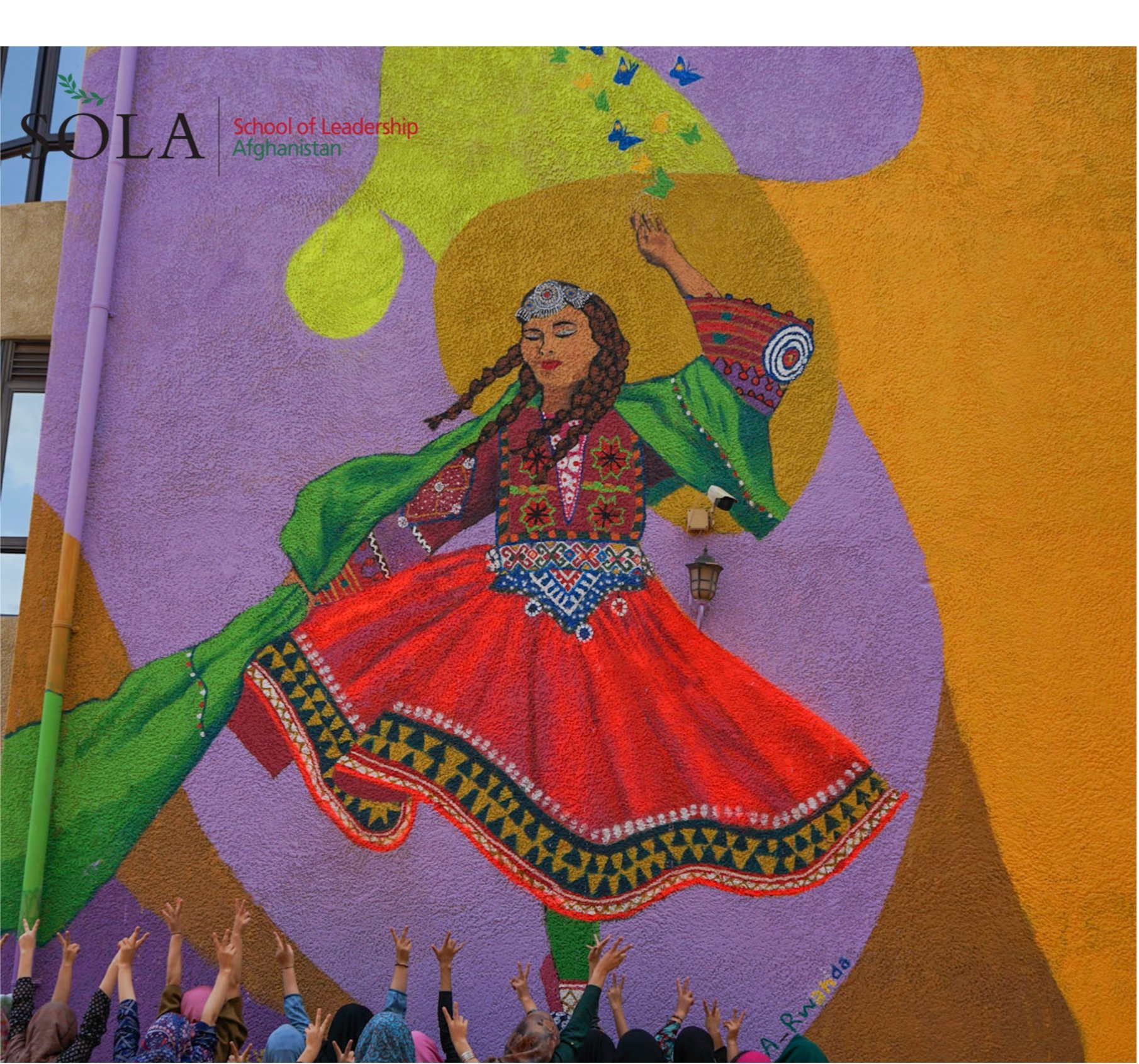  SOLA partnered with Colors of Connection where our students created a mural with a girl dancing the traditional Attan dance, celebrating Afghan culture and heritage and a homeland that they are now far away from. 