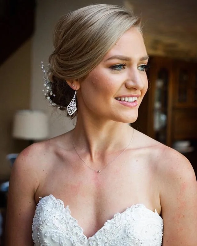 Looking back today on some of this falls wedding looks. Still loving the soft side swept updo for this beautiful brides wedding hair! 
#rochesternybeauty #rochesternyhair #amika #goldwellny #rocwedding 
Photos by the talented @clickclickbarrile