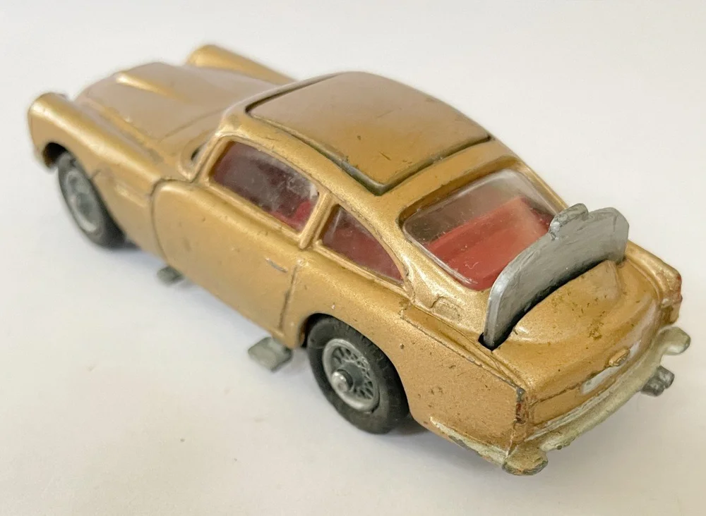 Aston Martin DB5 rouge métallisé 1/43e