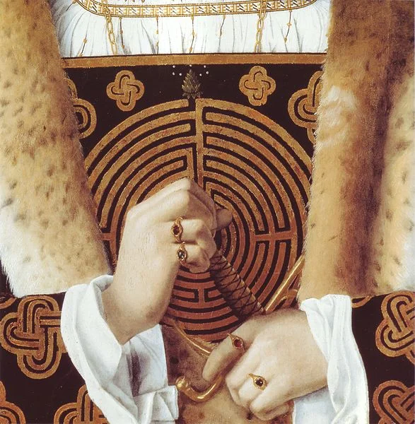 A portion of the painting Portrait of a man, with a labyrinth design on his chest, by Bartolomeo Veneto , Italy, early 16th century.