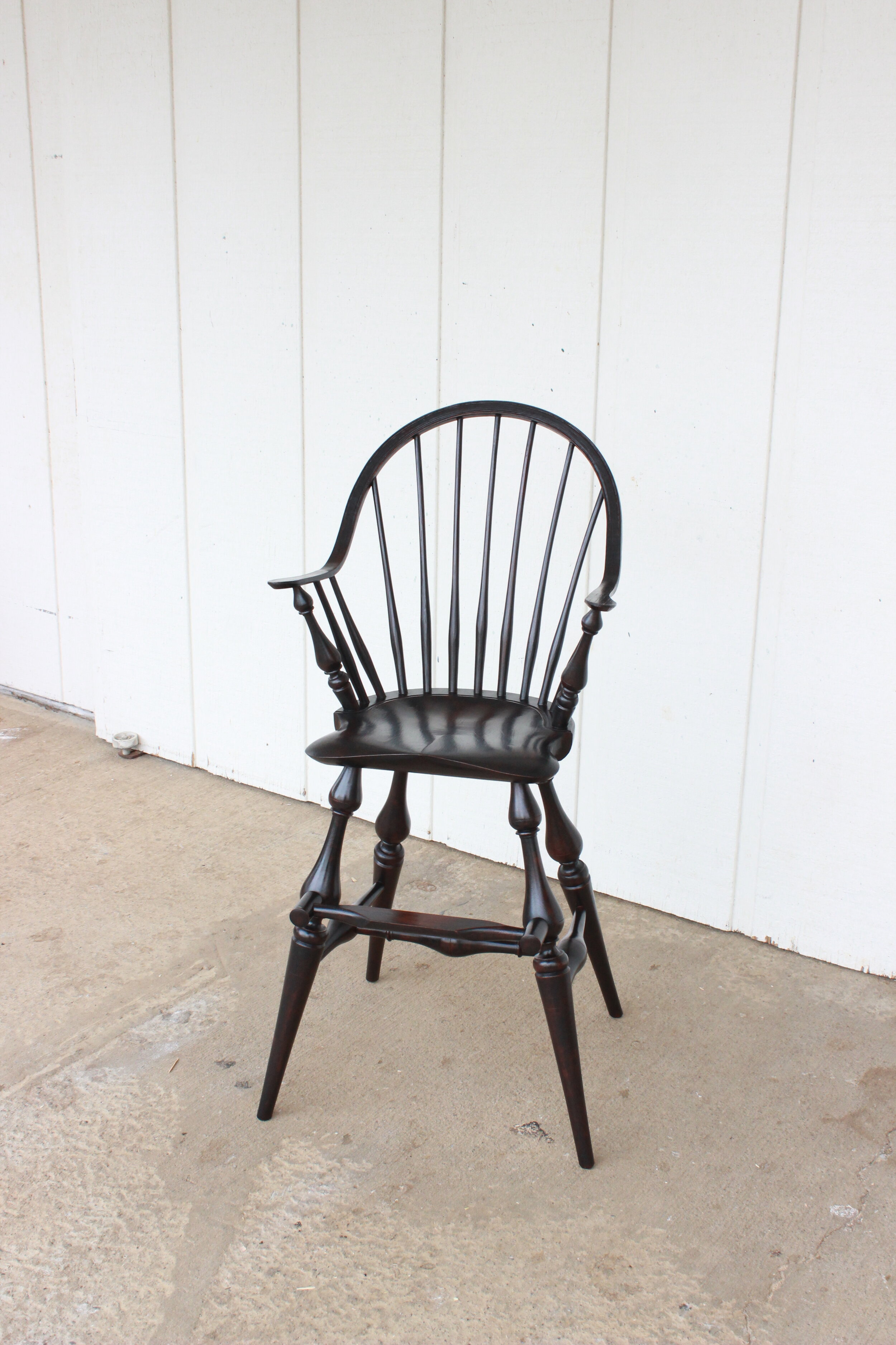 Continuous Arm High Chair