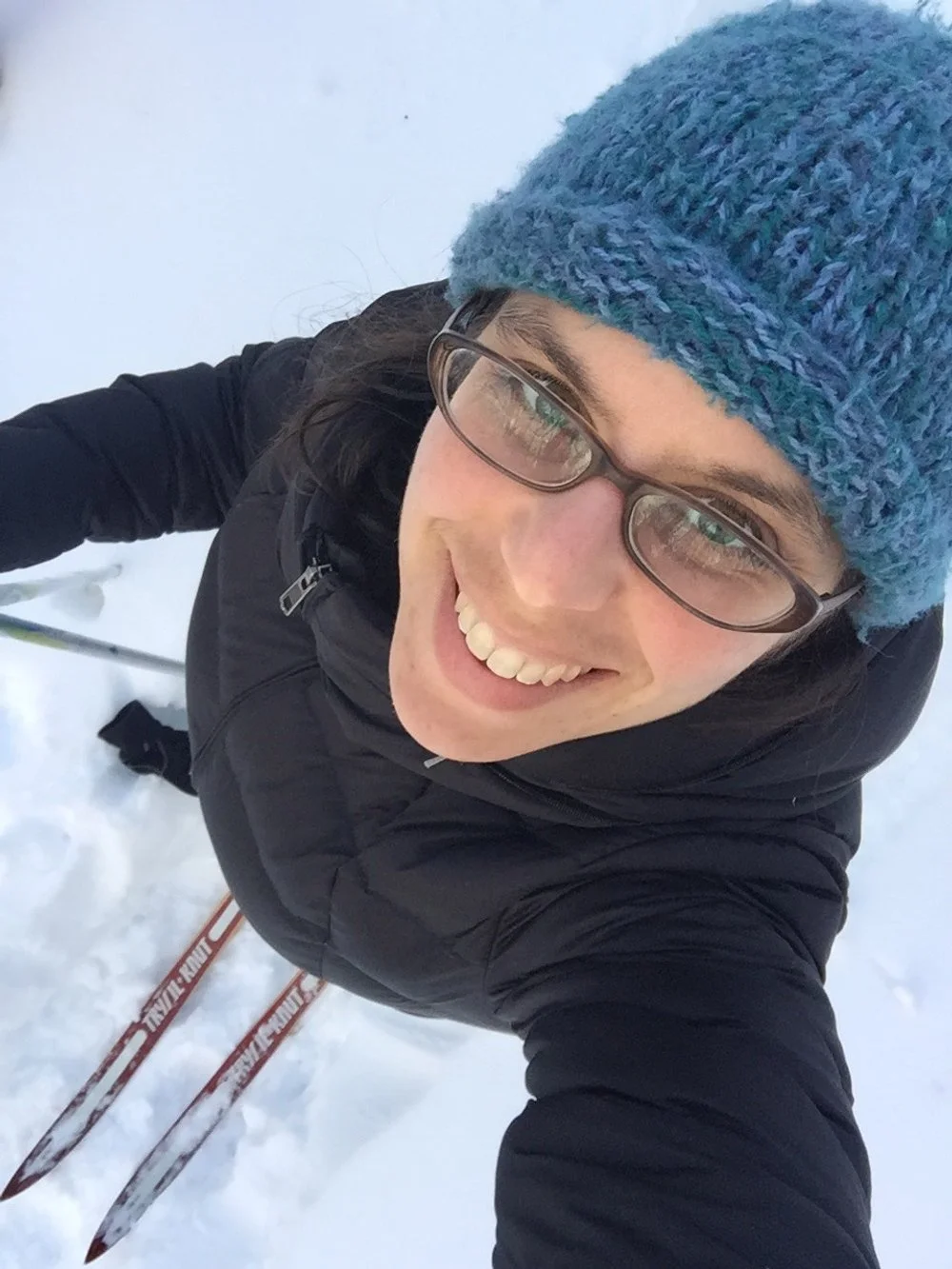 Sarah skiing selfie with wool hat
