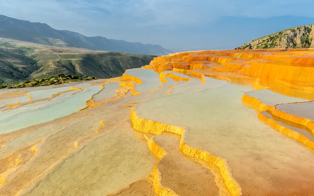 shutterstock_508204078-travertine-terrace-at-sunrise-near-orost-badab-e-surt-iran.jpg