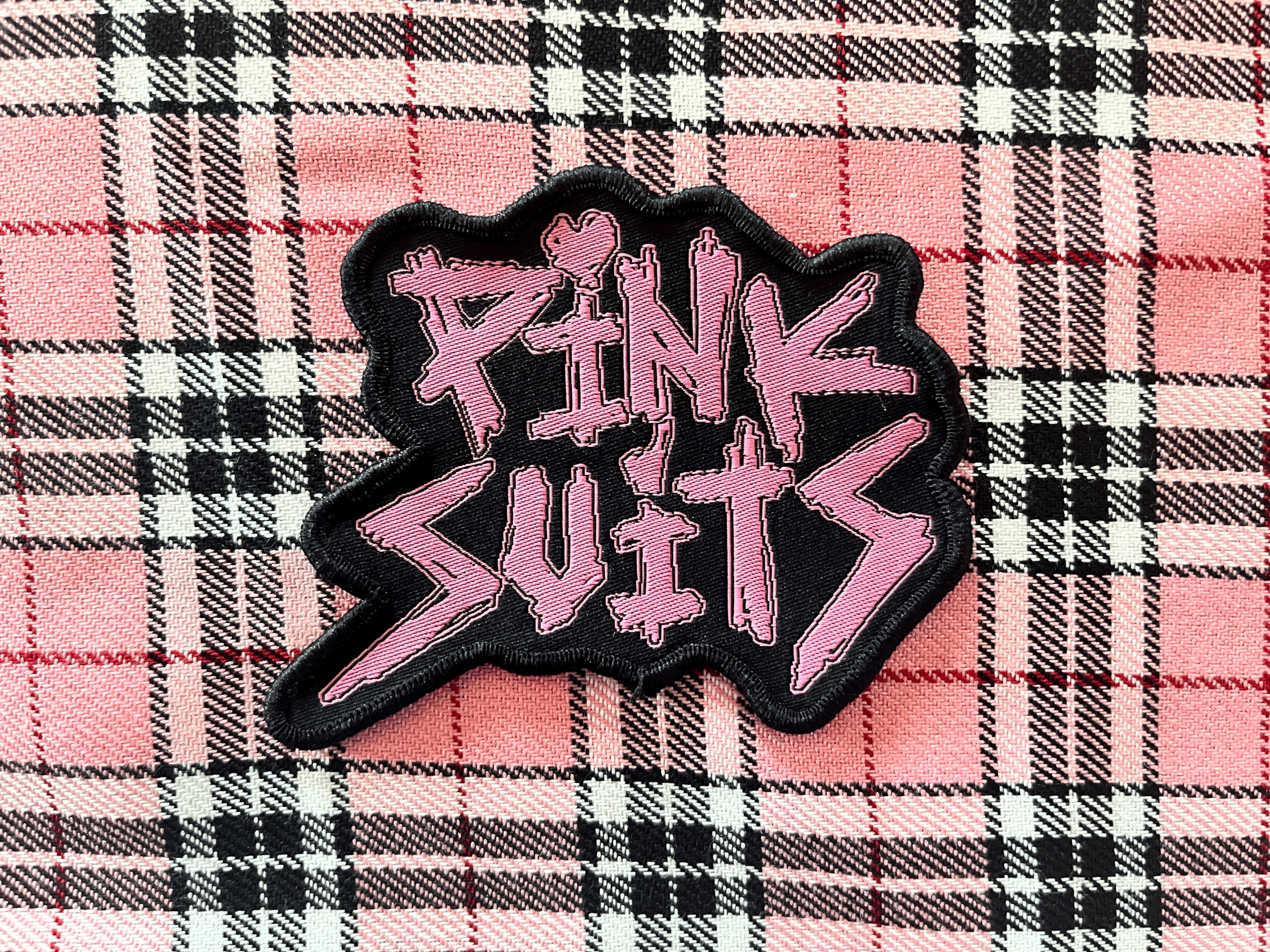 pink suits logo patch
